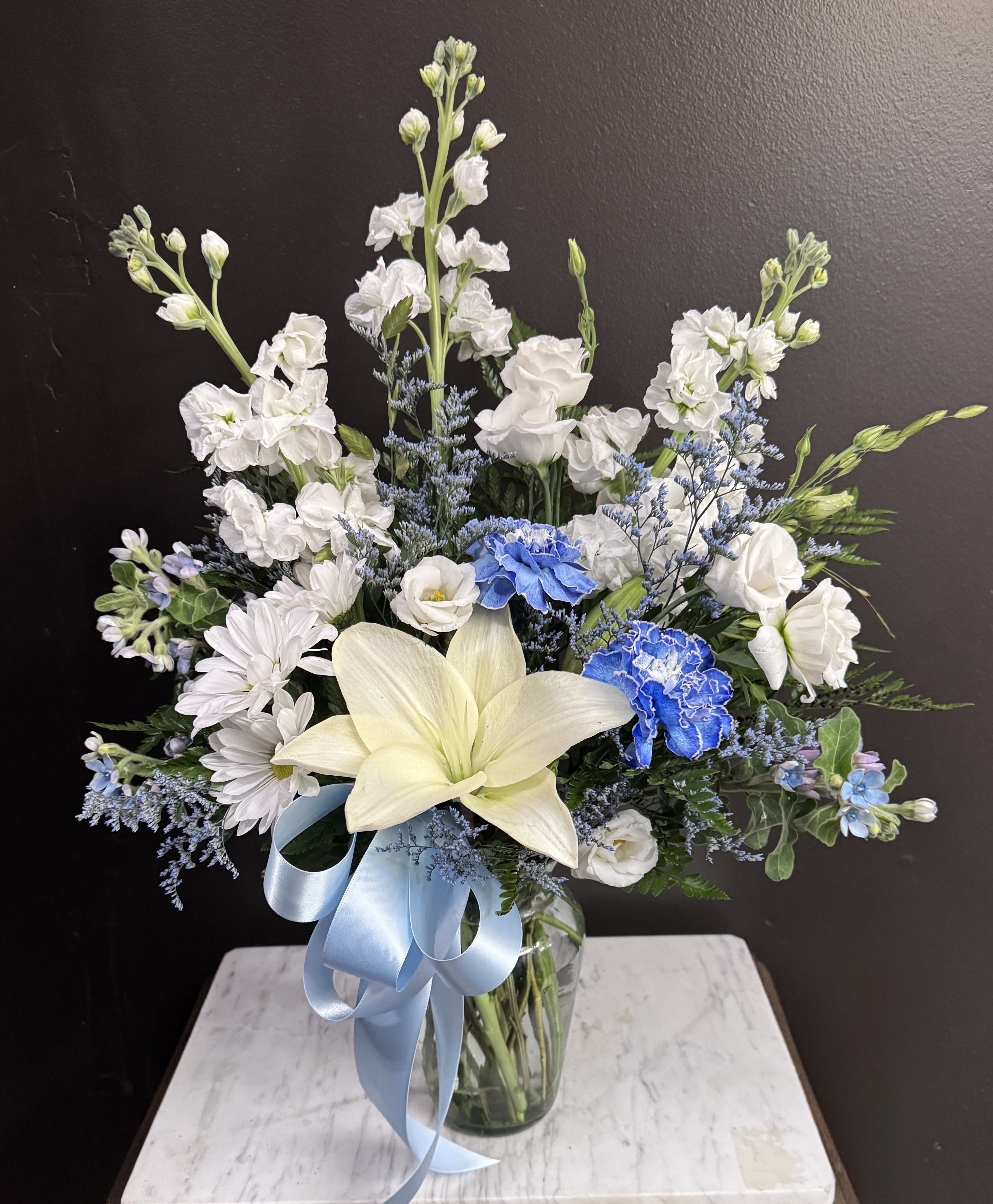 Baby Blues - Soft blues and whites in a clear glass vase.