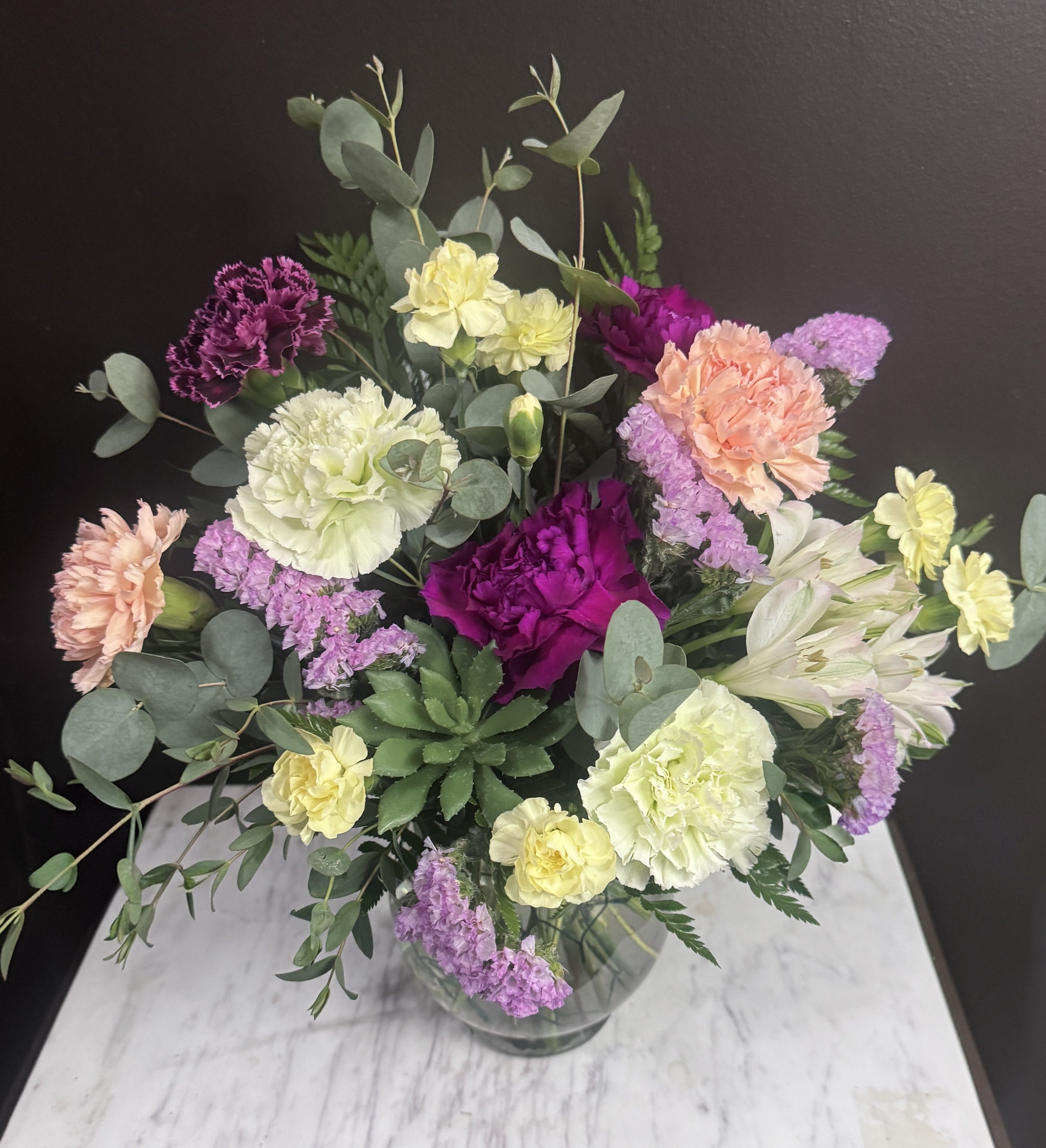 Desert Sunrise - Peaches and purples in a vase with a faux echeveria.