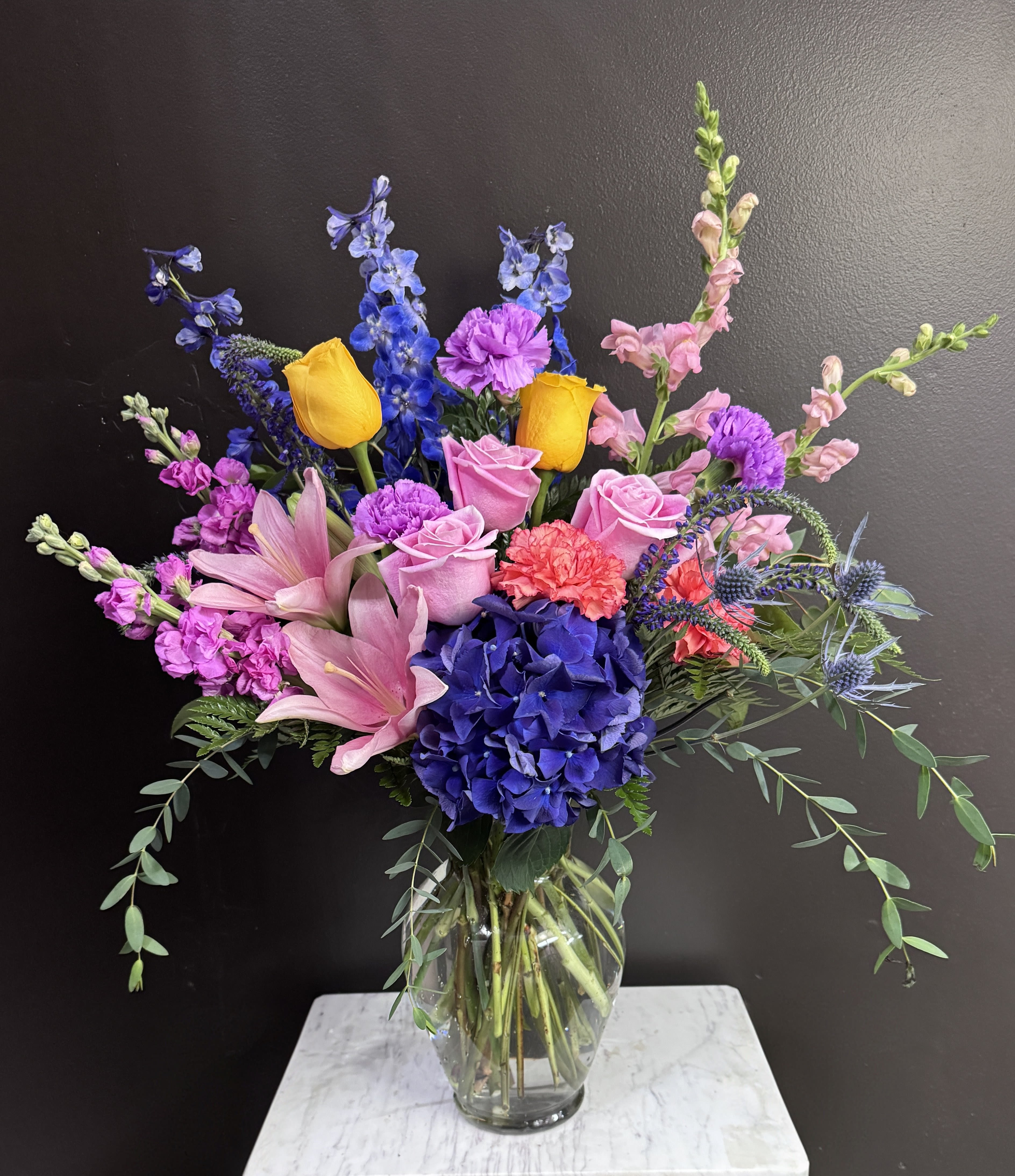 Feeling Festive - Colorful and fun in a clear vase, for any occasion.