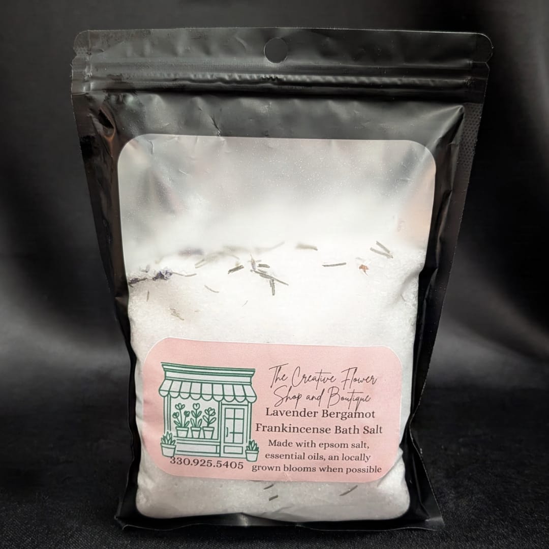 Bag of lavender bergamot frankincense bath salt with a pink label