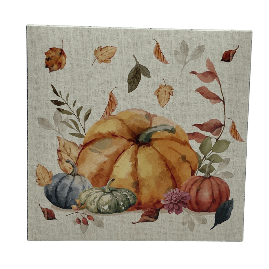 Fall pumpkin wall art with leaves and a small flower