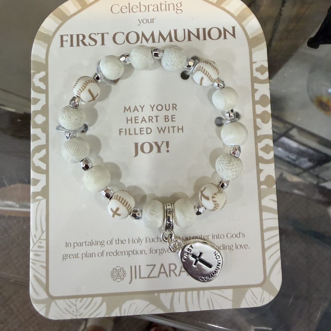 Beaded First Communion bracelet on a printed card