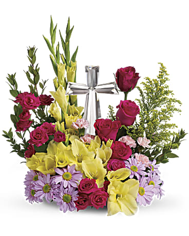 Bouquet of magenta roses, yellow calla lilies, and lavender daisies with a silver ribbon