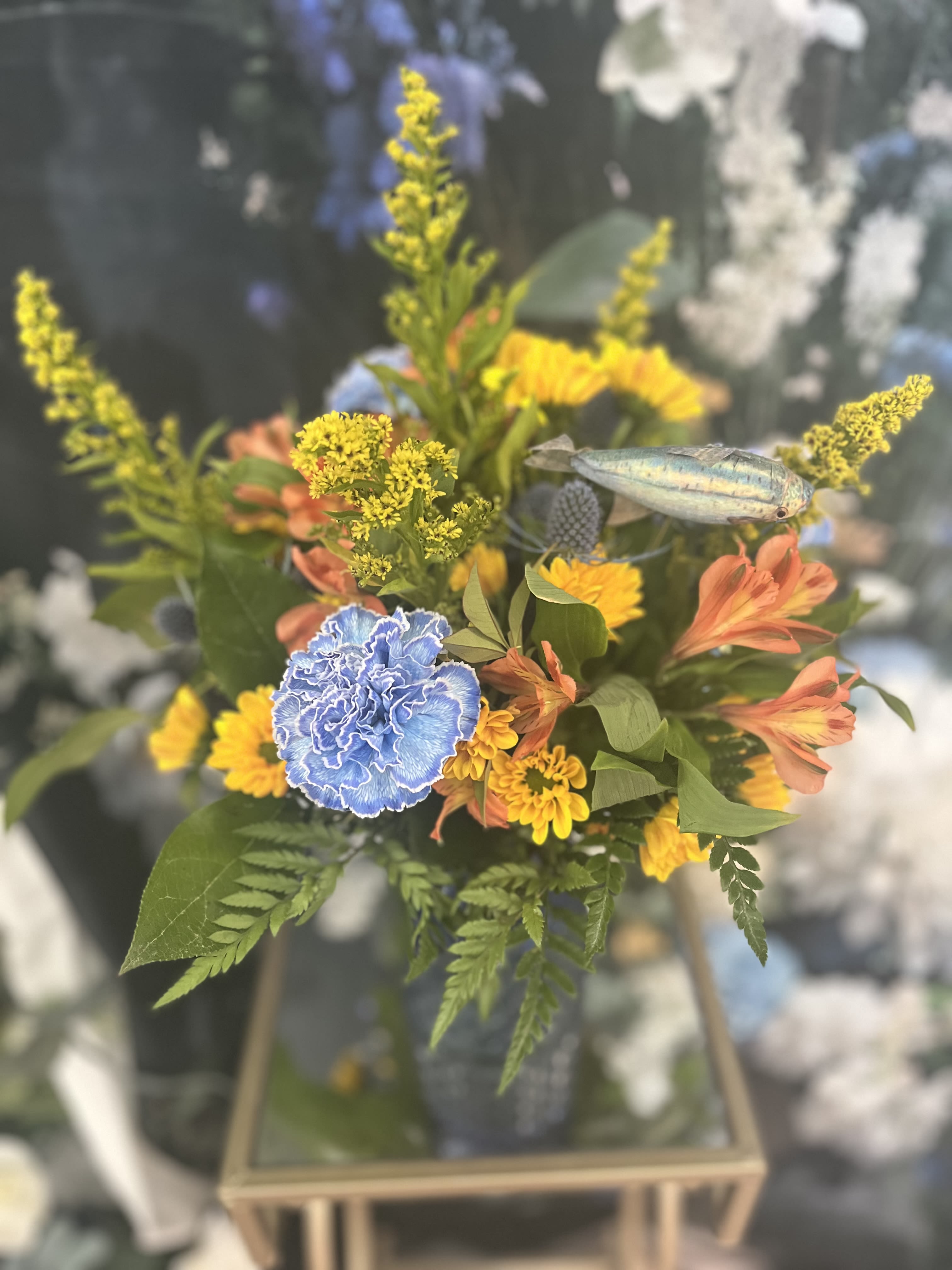 Father's Day Blooms - Dads deserve flowers too! This arrangement is sure to put a smile on his face! Happy Father's Day! Fish add-on is included in the price!
