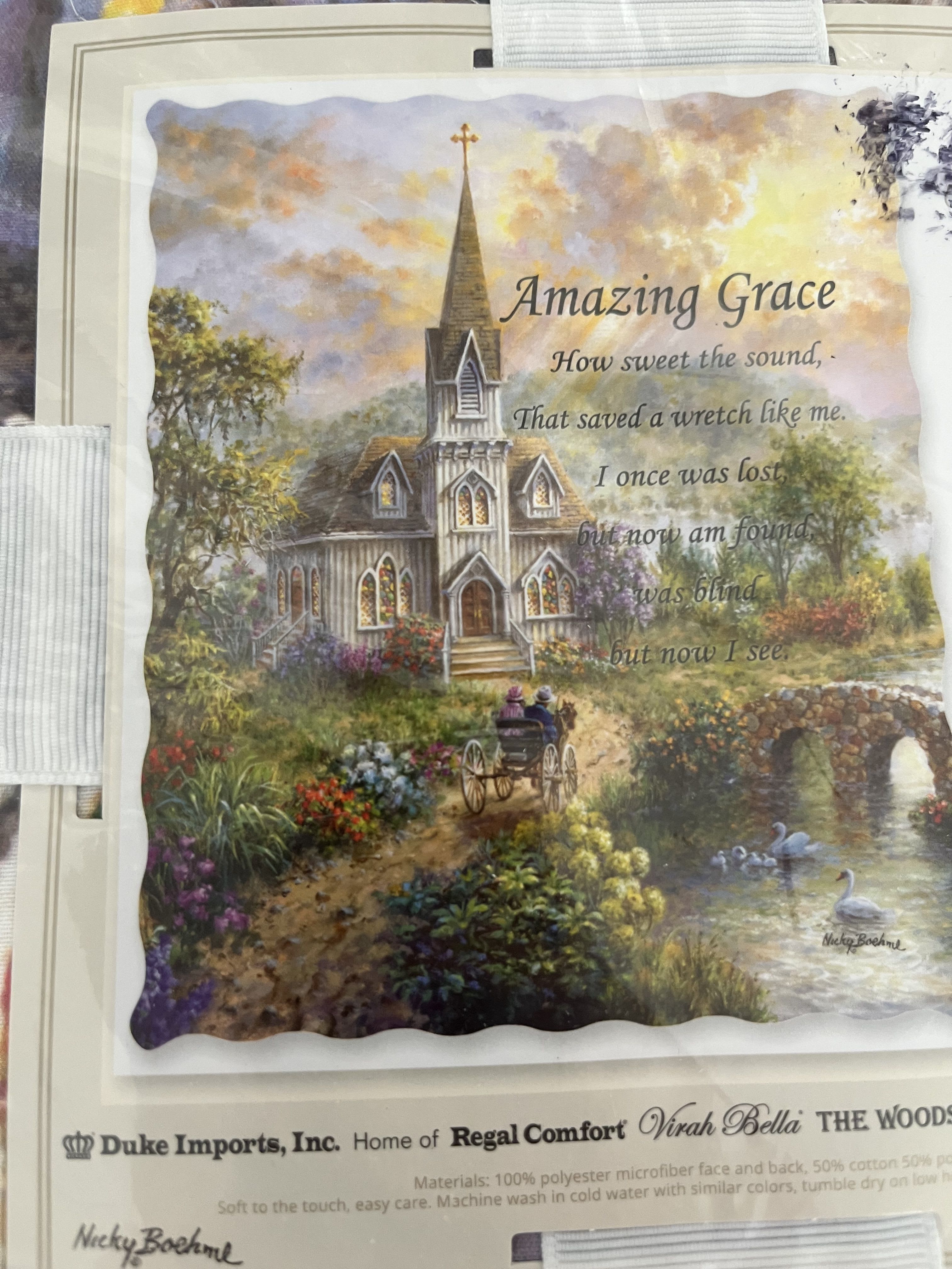 Amazing Grace Memorial Quilt Throw - The Deluxe option comes with a $15 metal easel for the blanket to stand up on and be seen with a bow. If you decide to go with the Standard option, the blanket will come folded with a bow.  A beautiful tapestry that makes the perfect memorial gift for a family member, close friend, or loved one. The slogan is etched with expert needlework and clearly displays the message of remembrance about your loved one.  This tapestry features the words: "Amazing Grace How Sweet the Sound That Saved a Wretch Like Me I once was Lost But Now am Found Was Blind but Now I See."