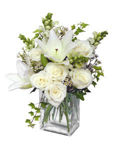 Wonderful White Bouquet of Flowers $68.00, $78.00, $88.00 Shown at $68.00 - square glass vase foliage: green 4 white snap dragons 6 white roses 1 stem white Asiatic lilies 2 stems white waxflower In some instances, our photo may represent an overall theme or look and include a one-of-a-kind vase which cannot be exactly replicated.  Although the actual bouquet may not precisely match the photo, its temperament will. Occasionally, substitutions of flowers and/or containers happen due to weather, seasonality and market conditions which may affect availability. If this is the case with the gift you’ve selected, we will ensure that the style, theme and color scheme of your arrangement is preserved and will only substitute items of equal value or higher value.  If any design elements are of major importance to your order, please include them in the florist instructions at checkout or contact us to ensure availability.