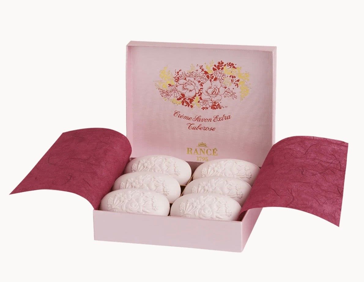 Pink gift box with six white oval soaps
