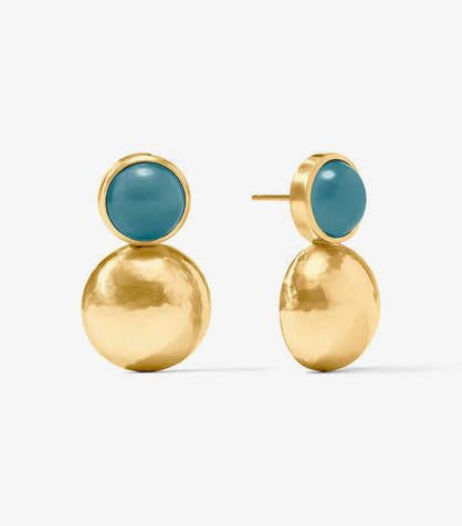Solara Midi Earring - Gold Solara Midi Earring with Iridescent Montana Blue Stone  Discover the art of giving at Petals, Wilmington, Delaware’s destination for luxury gifts and home décor. Our curated collection features beautifully crafted items for every occasion — birthdays, weddings, anniversaries, holidays, and life’s special celebrations. At Petals, we believe every gift should tell a story. From hand-poured candles and elegant keepsakes to stylish home accents, gourmet treats, and floral-inspired décor, our selection combines timeless charm with modern sophistication. Each piece is chosen with care to reflect the quality, creativity, and personal touch our Wilmington customers love.  Same-day delivery available throughout Wilmington and nearby areas including Greenville, Hockessin, Newark, and the Brandywine Valley Whether you’re looking for a thoughtful hostess gift, a luxury home accent, or something simply beautiful to brighten someone’s day, Petals offers fine gifts and personalized service that make every occasion memorable. Visit our Wilmington boutique or shop online today — and see why Petals is Delaware’s trusted name for fine gifts and inspired giving.