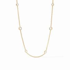 Aquitaine Station Necklace - Clear Crystal  - Gold Julie Voss Aquitaine Station Necklace with Clear Crystal colored stone.   Discover the art of giving at Petals, Wilmington, Delaware’s destination for luxury gifts and home décor. Our curated collection features beautifully crafted items for every occasion — birthdays, weddings, anniversaries, holidays, and life’s special celebrations. At Petals, we believe every gift should tell a story. From hand-poured candles and elegant keepsakes to stylish home accents, gourmet treats, and floral-inspired décor, our selection combines timeless charm with modern sophistication. Each piece is chosen with care to reflect the quality, creativity, and personal touch our Wilmington customers love.  Same-day delivery available throughout Wilmington and nearby areas including Greenville, Hockessin, Newark, and the Brandywine Valley Whether you’re looking for a thoughtful hostess gift, a luxury home accent, or something simply beautiful to brighten someone’s day, Petals offers fine gifts and personalized service that make every occasion memorable. Visit our Wilmington boutique or shop online today — and see why Petals is Delaware’s trusted name for fine gifts and inspired giving.