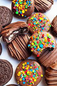 Assorted chocolate truffles topped with colorful candy pieces