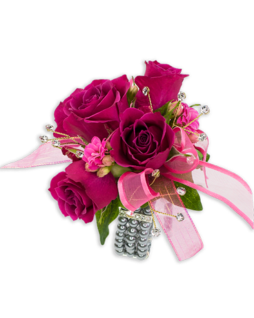 Pink rose corsage with ribbon and rhinestone accents