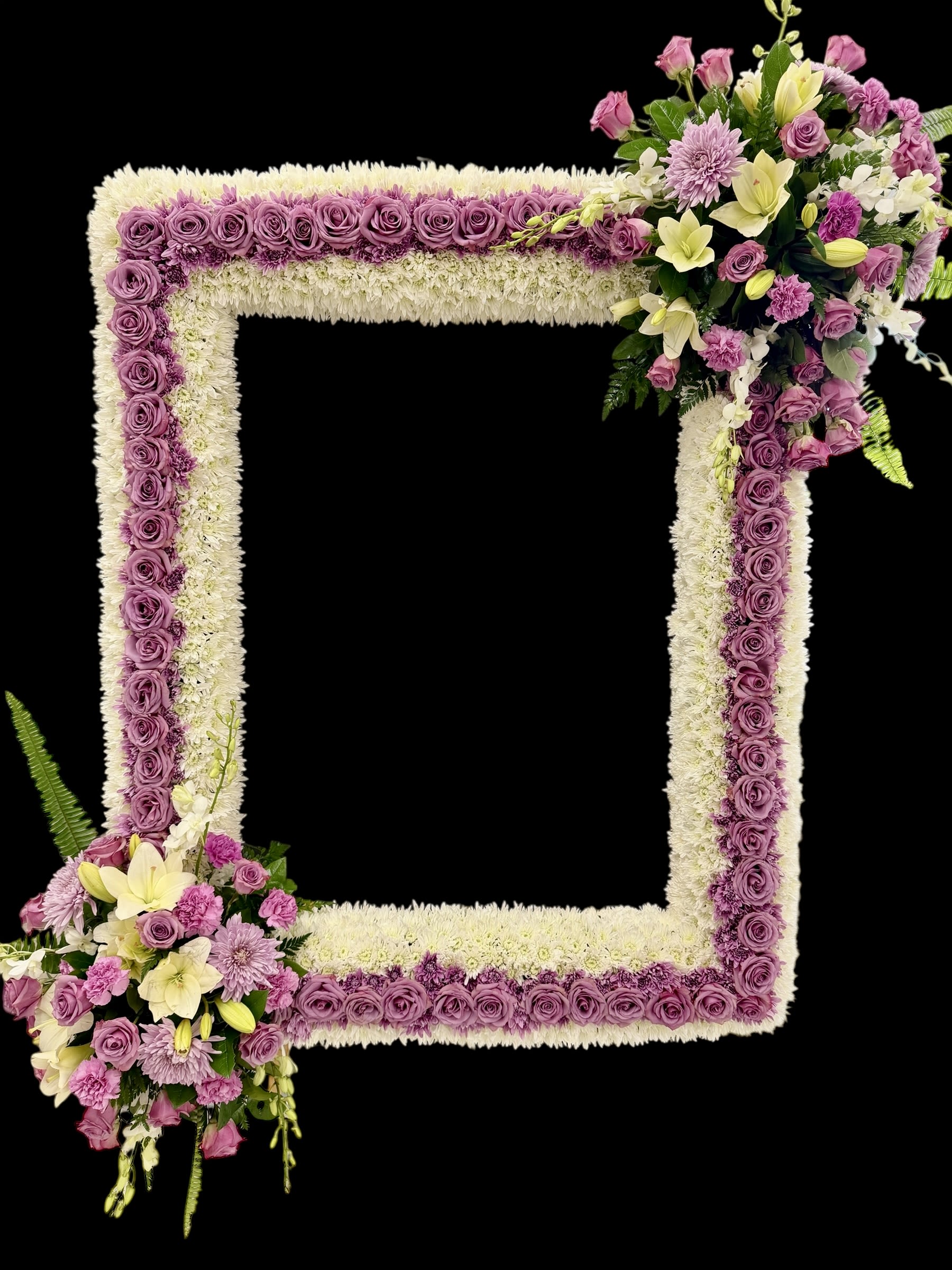 Square floral frame with purple roses and white flowers on a black background