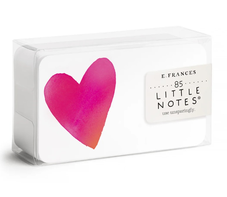 Boxed set of pink heart-shaped notes in clear plastic packaging