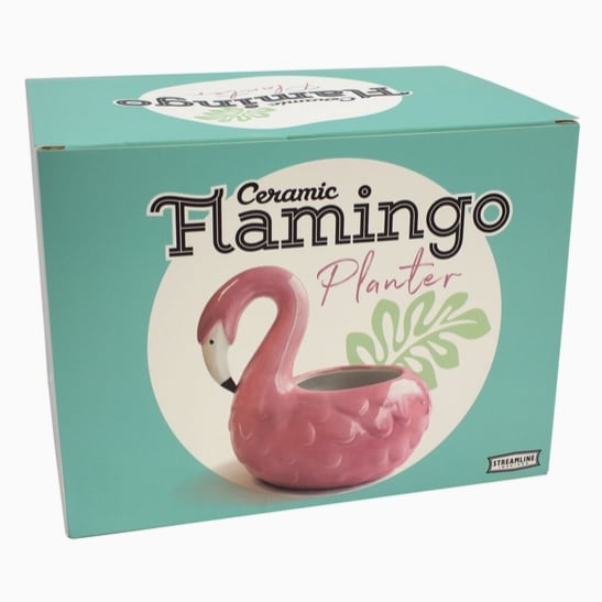 Flamingo Planter - Description Bring instant tropical whimsy to your home! This retro-styled Flamingo Planter is crafted and glazed by hand from high quality ceramics - beautifully earning a spot in your sunniest window. This sweet tropical bird planter can be displayed indoors or outdoors (should not exceed freezing temperatures outdoors). This charming planter pot comes to you in a custom designed full color box, and makes the perfect birthday, holiday, or any occasion gift. Show off your favorite flower or spiky succulent in this gorgeous pink colored Flamingo Planter!  Material: Ceramic Packaging: Color Box Made in China Weight: 1.2 lb (0.54 kg) Dimensions: 6.9 x 5.1 x 6.3 in (17.5 x 13 x 16 cm)