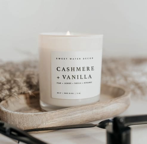 Cashmere Vanilla 11oz Candle - Description The Cashmere and Vanilla candle blends bourbon vanilla, coconut, and cashmere for a luxurious, aromatic experience perfect for Spring and Summer (and beyond).  Scent Notes: • Top: Milky Coconut • Middle: Jasmine, Soft Cashmere, Bourbon Vanilla, Pear • Base: Creamy Sandalwood, Tonka Bean, Exotic Musk Candle Info: • Volume: 11oz | 214g Net Weight | 3 x 3 x 3.5" • Burn Time: 50+ Hours • Wick: 100% Cotton (Lead &amp; Zinc Free) • Wax: Proprietary Soy Based Wax Blend | Vegan, Non-GMO, Kosher • Premium Fragrance Oil • Gluten Free, Phthalate Free, Non-Toxic • Made in Pittsburgh, PA 