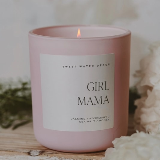 Girl Mama 15 oz Soy Candle, Matte Jar - Description For the mom who treasures every little giggle and hug, our Girl Mama candle fills the room with the fresh, uplifting Wildflowers and Salt fragrance. Light it to enjoy notes of blooming florals and a hint of sea breeze, creating a serene, joyful atmosphere.  Ideal for Mother’s Day, baby showers, gender reveals, or just celebrating the special bond with her daughter, it’s a thoughtful gift for any proud girl mama.  SCENT NOTES: • Top: Lemon, Rosemary, Leafy Green  • Middle: Jasmine, Lily, Honey, Violet • Base: Sea Salt, Amber, Musk   CANDLE INFO: • Size: Volume 15oz | 334g Net Weight | 3.25 x 3.63 x 4" • Burn Time: 70+ Hours • Includes wood lid • Wick: 100% Cotton (Lead &amp; Zinc Free) • Wax: Proprietary Soy Based Wax Blend | Vegan, Non-GMO, Kosher • Premium Fragrance Oil • Gluten Free, Phthalate Free, Non-Toxic • Made in Pittsburgh, PA