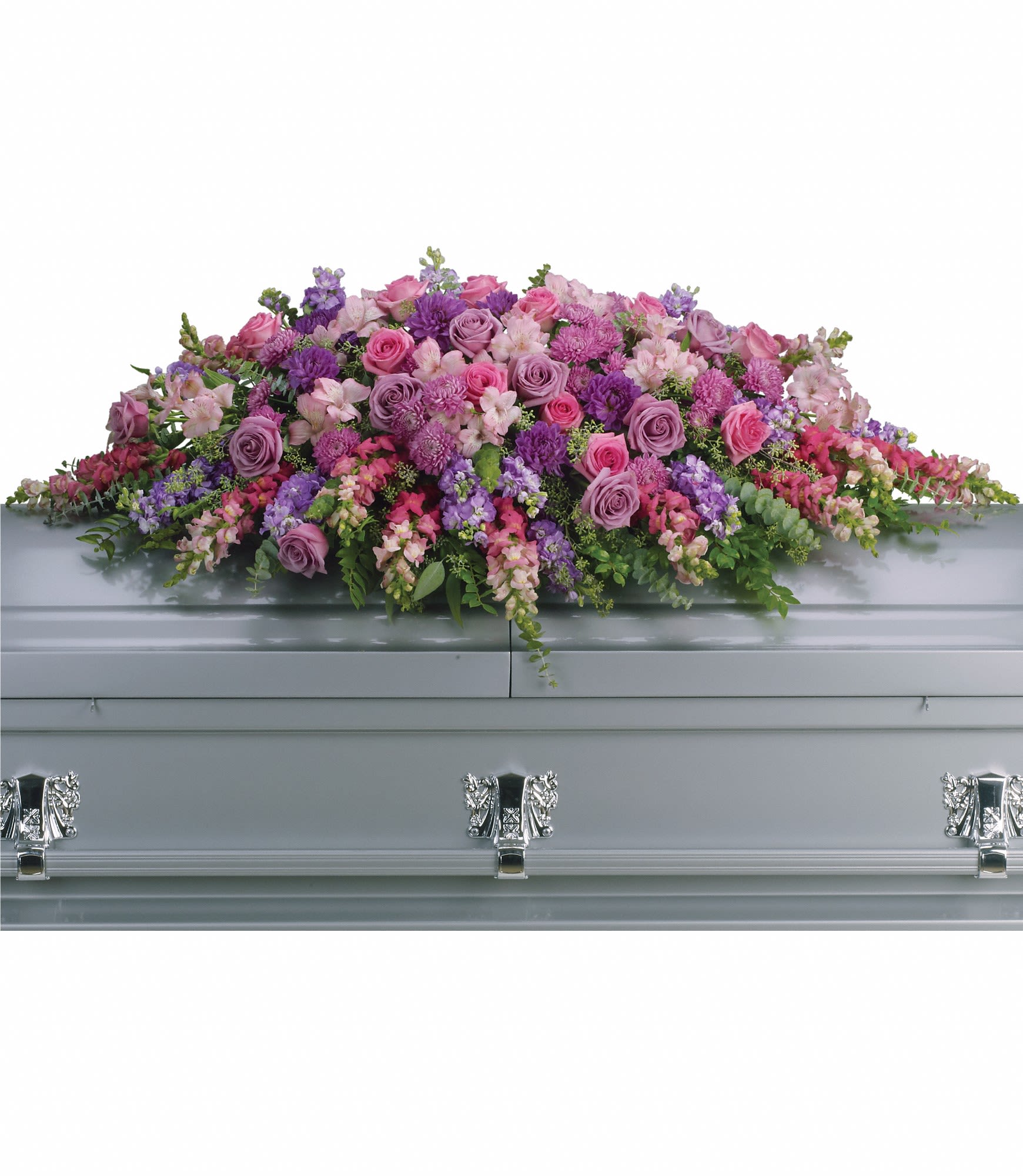 Lavender and pink floral casket spray on a silver casket