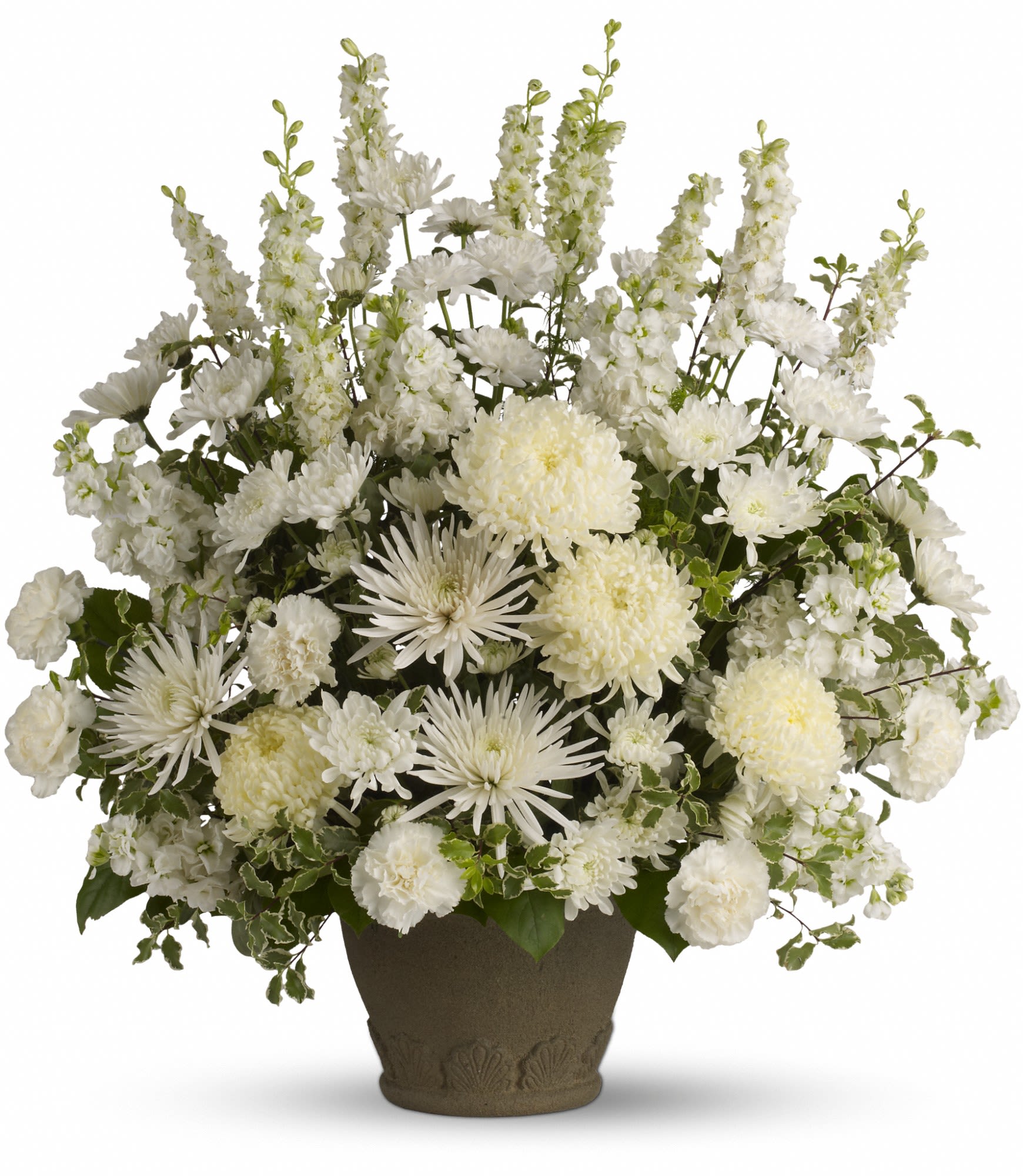 White floral arrangement in a dark vase with tall spires and round blooms
