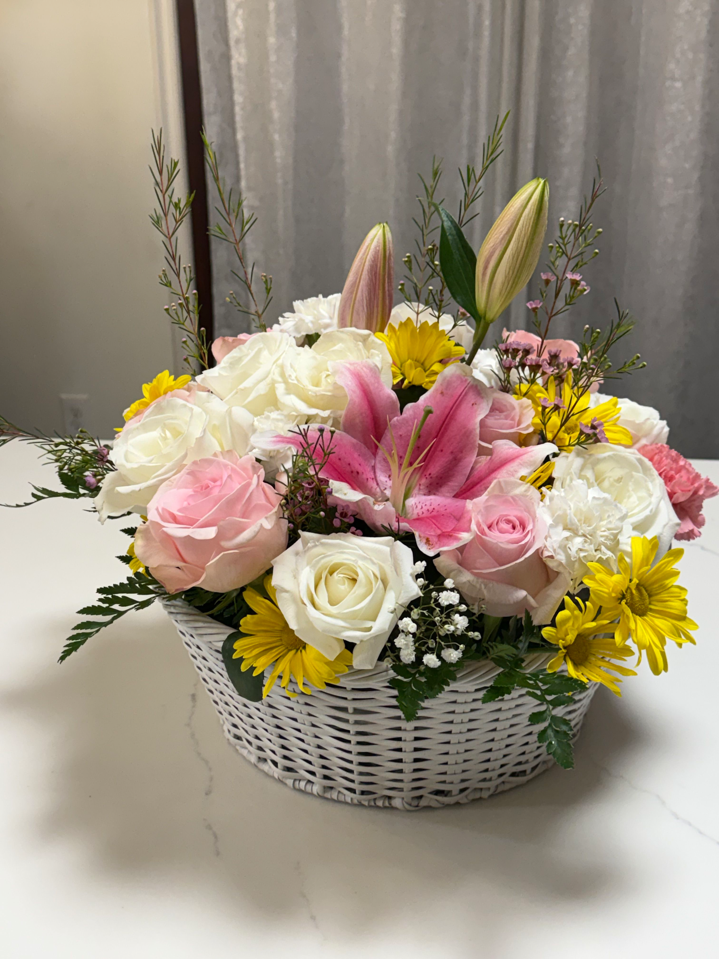 Sweet Harmony Basket - Amazing Big basket full of white, pink and roses. Yellow daisies also includes one lily,  the color will be depending on the ones we have that is opening so we can stick to our design it will be pink, white or yellow.  Let us know if you wish not to have lilies and we will add animal safe options. we love seeing everyone happy. 