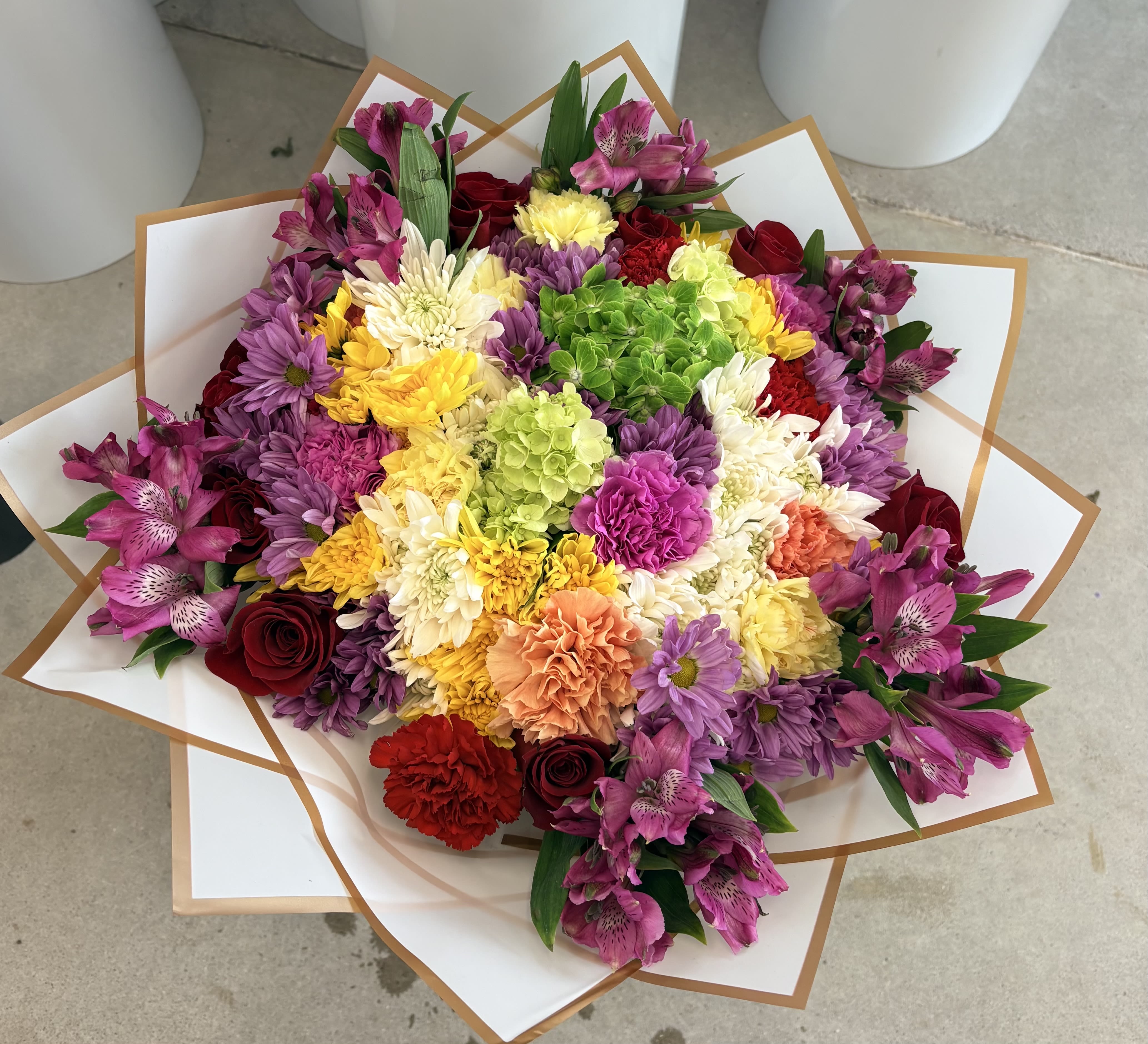 Spring Elegance - Ideal for birthdays, anniversaries, congratulations or a heartfelt thank-you, Spring Elegance arrives ready to impress and linger in memory. To keep the bouquet looking its best, place stems in fresh water on arrival and recut stems before arranging in a vase (vase available as an add-on).