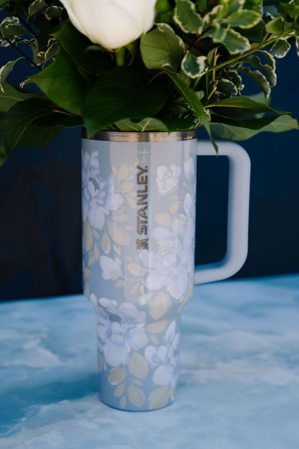 Mom's Garden (Tumbler Only) - This tumbler is a one-of-a-kind, hand-painted piece sealed with a clear gloss powder coat—dishwasher safe, chip-resistant, and made to last; by artist Melanie Haggard @meligrafi. Want the tumbler with flowers? Just click the “Occasions/Mothers Day” tab at the top of the page.