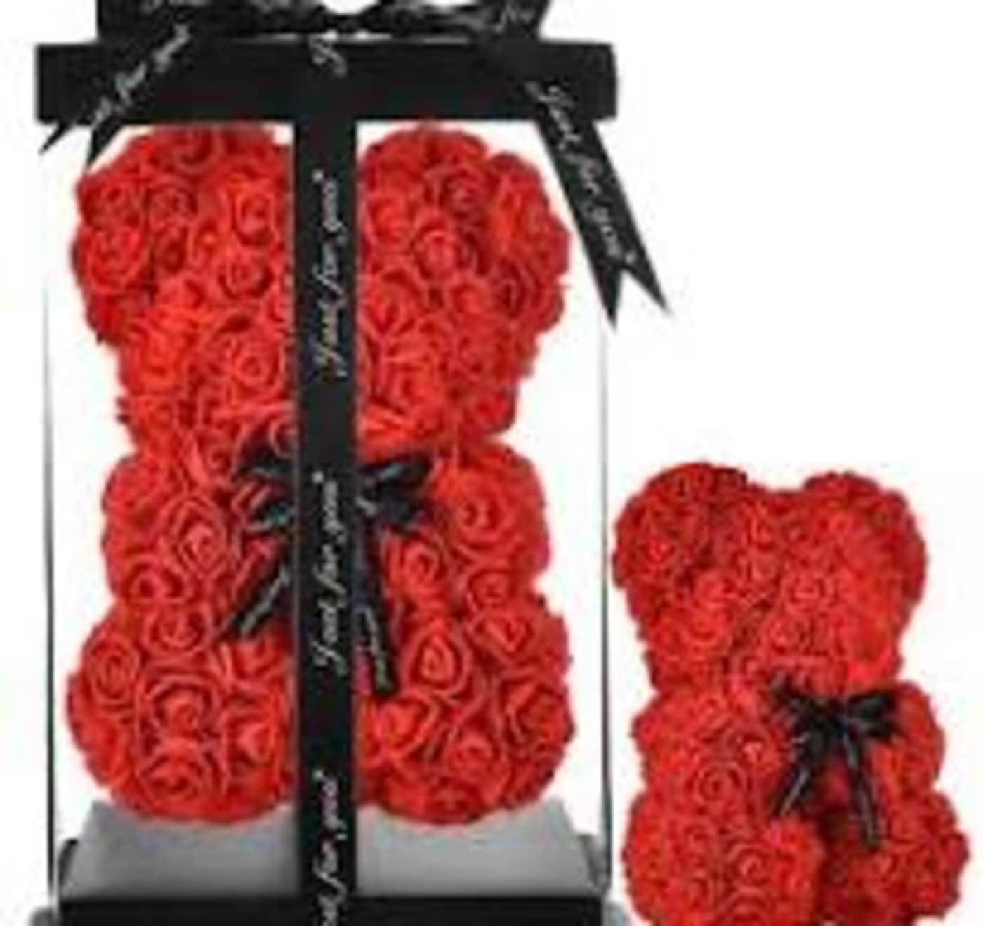 Red rose teddy bear in a black gift box with ribbon