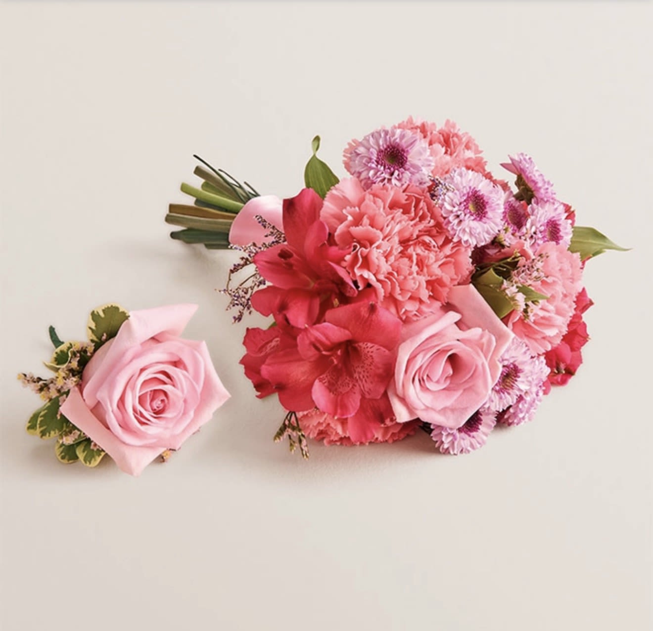 Bouquet &amp; Boutonniere Set (Pink) - A beautifully coordinated bouquet and boutonniere set designed to complement each other with elegant balance and timeless charm. Crafted with carefully selected blooms and textures, this pairing adds a refined, cohesive touch to any special occasion.