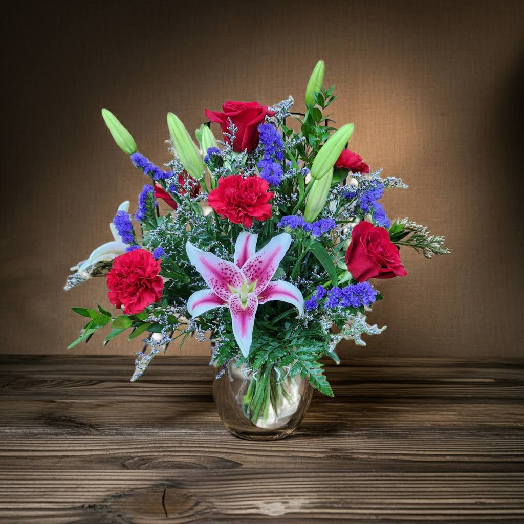 V19 Stunning Beauty - Huntsville delivery - Vase Arrangement Mixed seasonal Flowers Lily color may vary