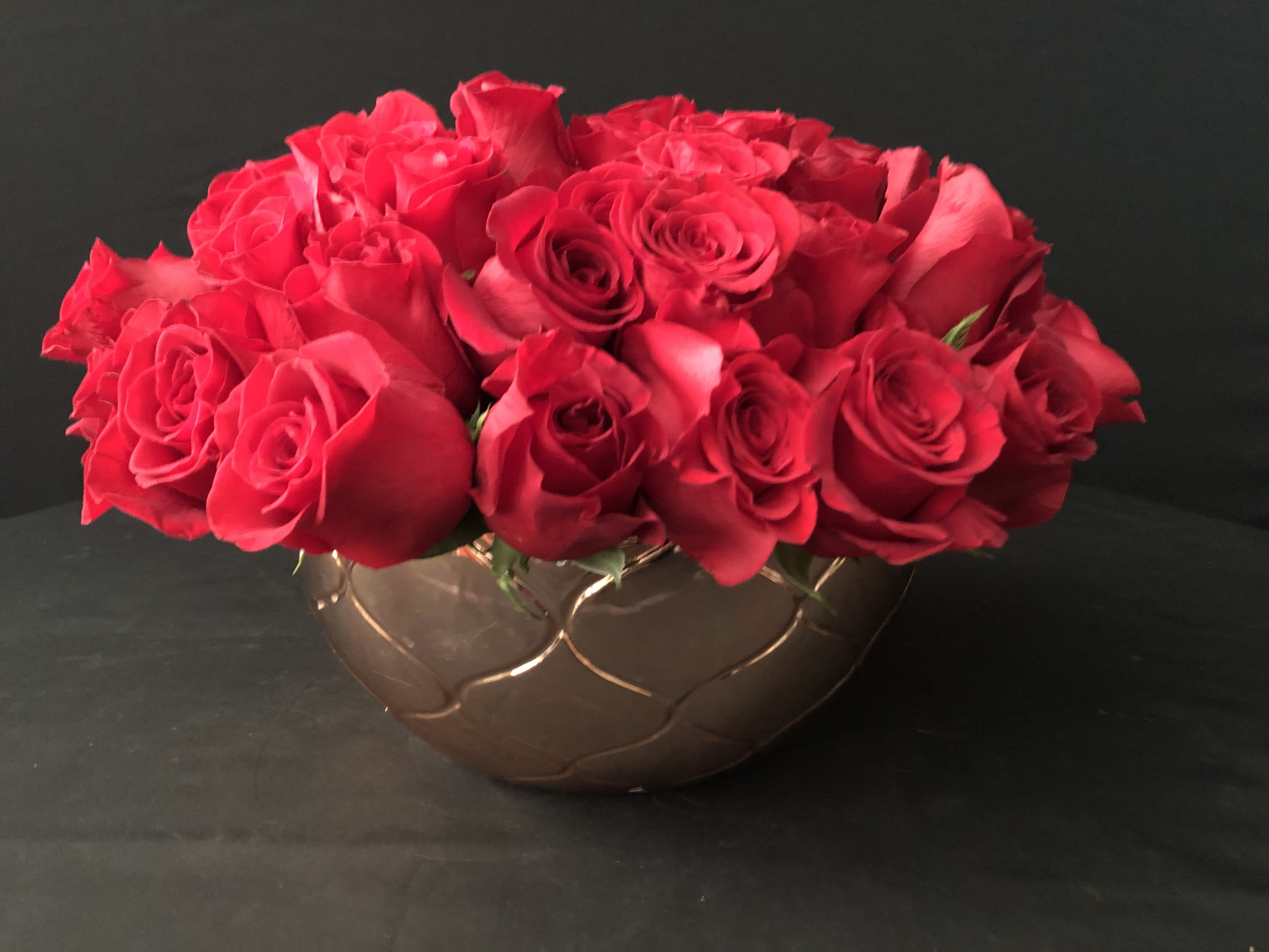  Red rose love bowl! - 50  red roses in a modern rose gold bowl. She will smile when she sees these coming to her door.  I’ve special ordered big head roses (high rose petals count) for this stunning LOVE design. 