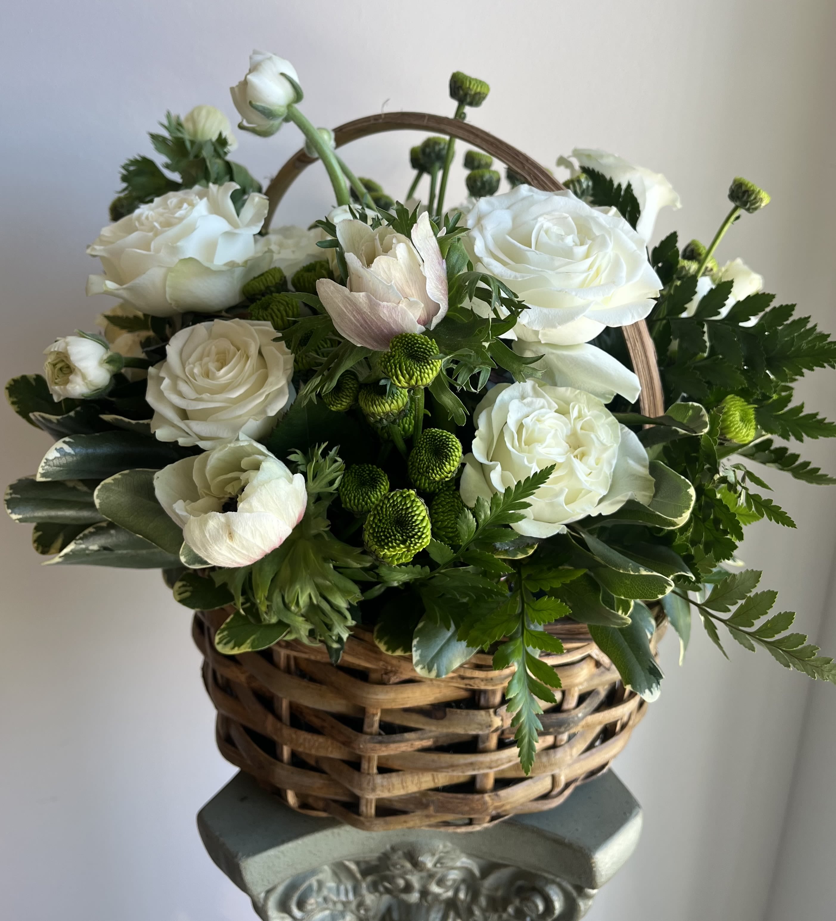 Audrey Basket -- Custom Floral Basket - Elevate the classic basket arrangement with a custom-designed display of fresh, seasonal flowers tailored to your style. Choose from soft neutrals, romantic pastels, vibrant colorful blooms, or your own preferred palette to create a one-of-a-kind arrangement, thoughtfully designed for any occasion. A beautiful, personalized floral gift that brings a refined touch to the timeless basket arrangement.