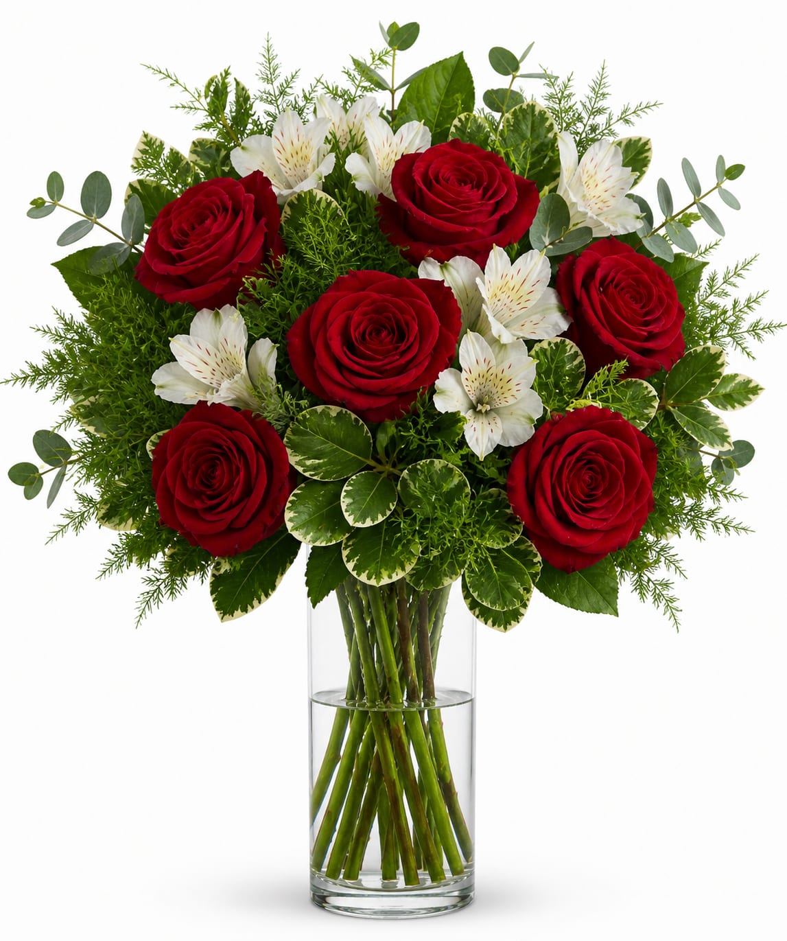 Bellissimo - by Wonderland Flowers  - A half dozen red roses and alstroemeria surrounded by variegated pittosporum with a touch of evergreen, is sure to be a hit! The arrangement is created in a clear cube shaped vase. *Picture is of deluxe option. 