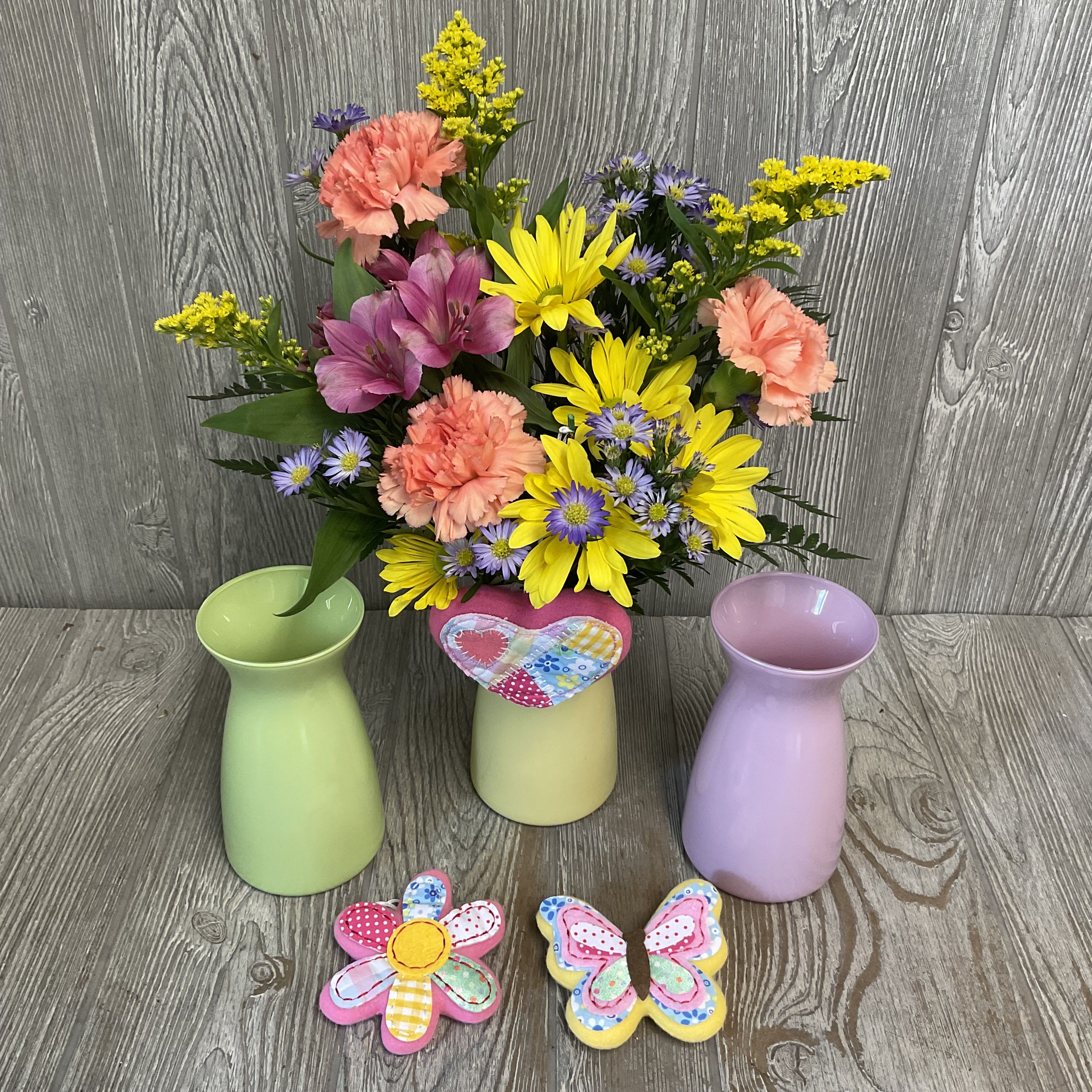 Sew Grateful - A beautiful colorful arrangement of fresh cut flowers arranged in a vase perfect for your mom this Mother’s Day! Flowers, vase color, and sewn inclusion may vary. 
