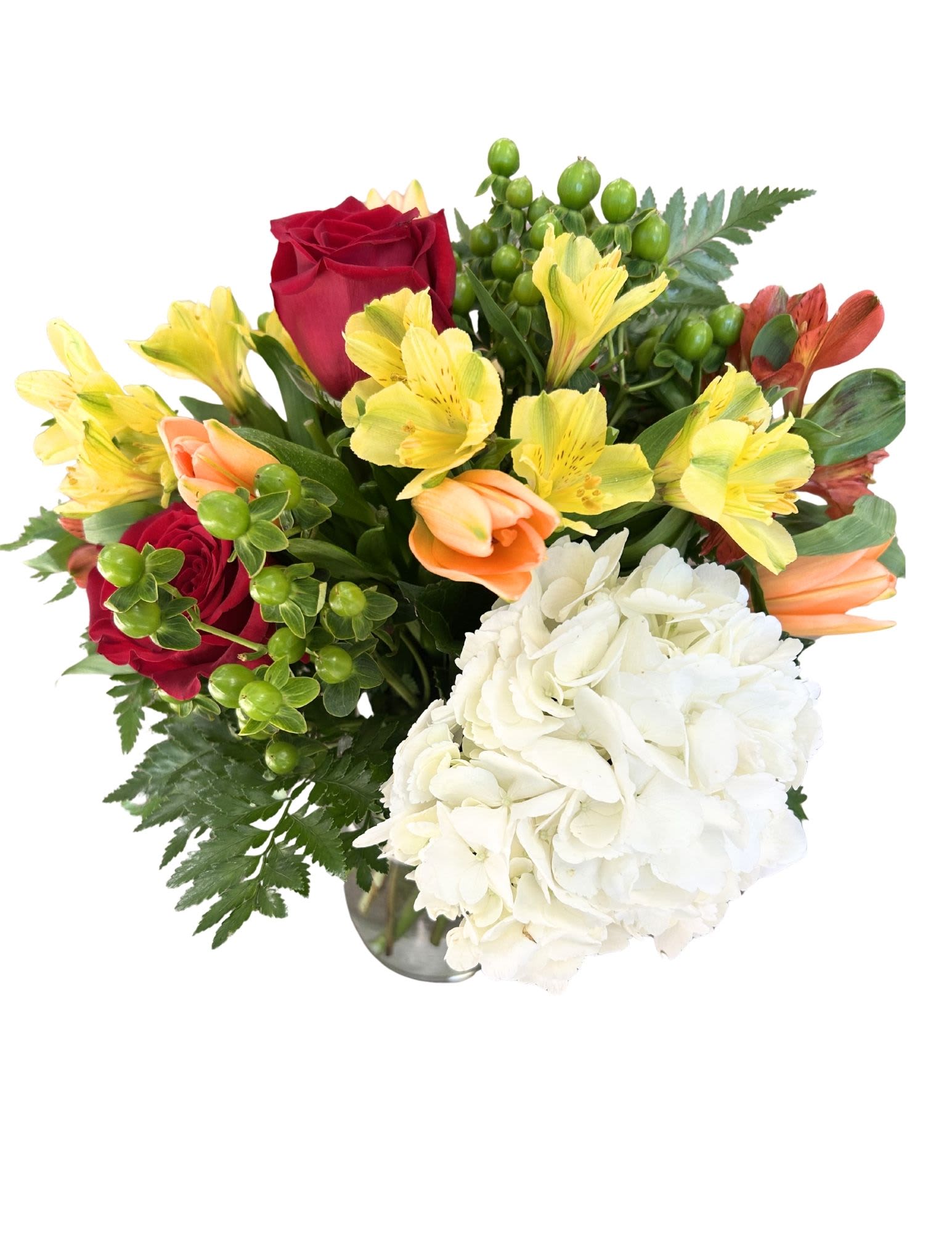Mixed bouquet with red roses, yellow alstroemeria, and white hydrangea in a vase