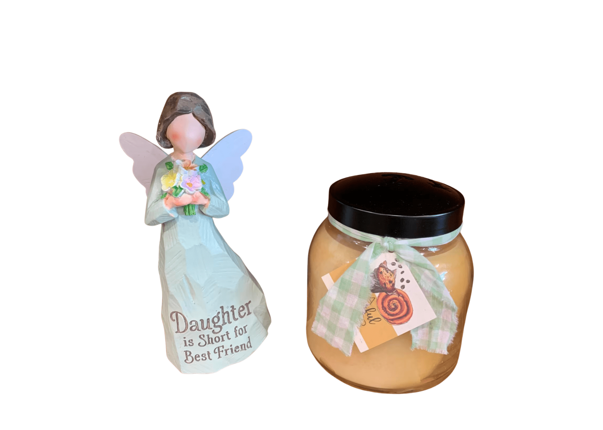 Angel figurine and a candle jar with ribbon and tag