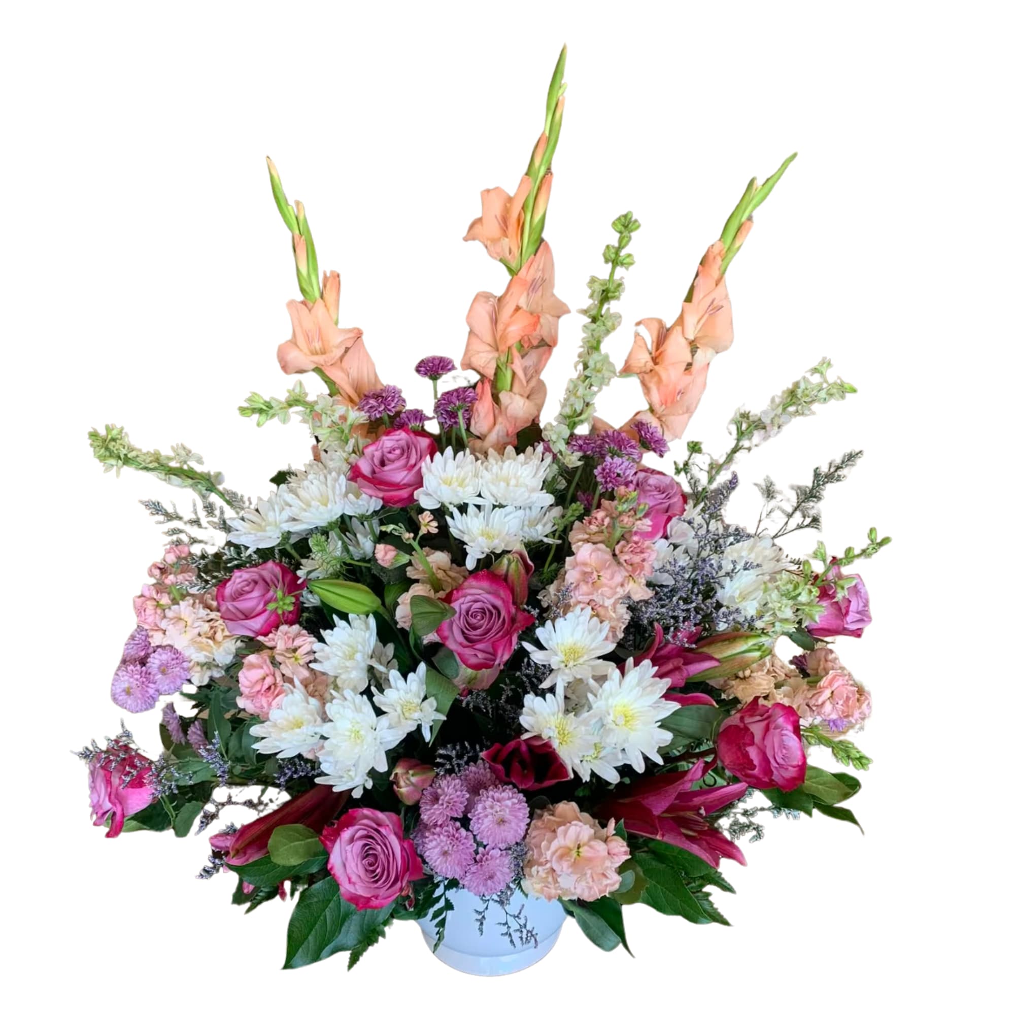 Grace - Standing spray to say you care. Roses, gladiolus, chrysanthemums, and lilies make up this beautiful arrangement.