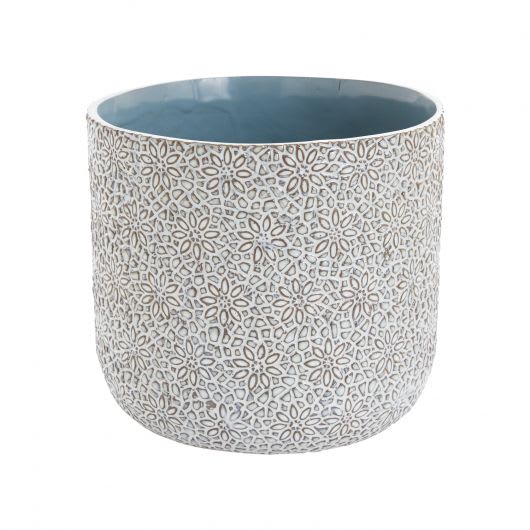 Patterned ceramic planter with a blue interior