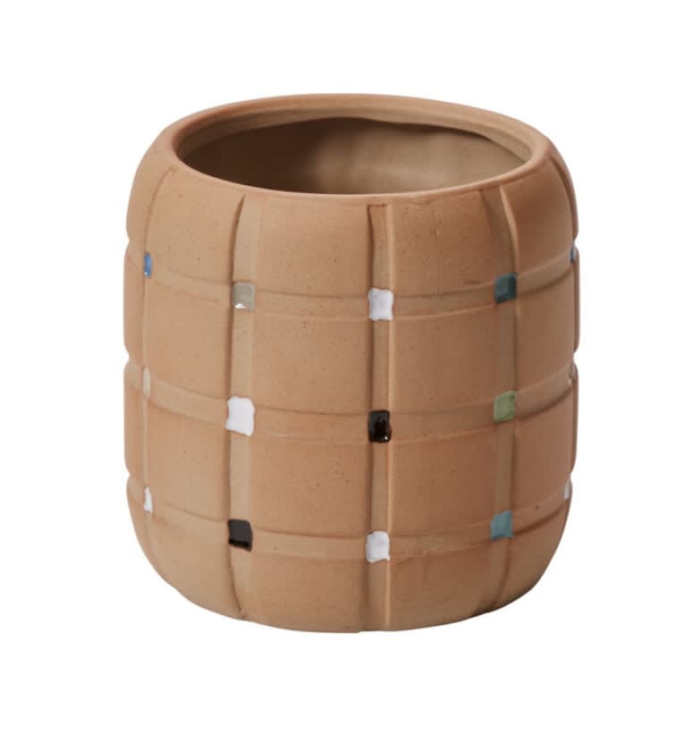 Textured tan ceramic planter with small colored square accents