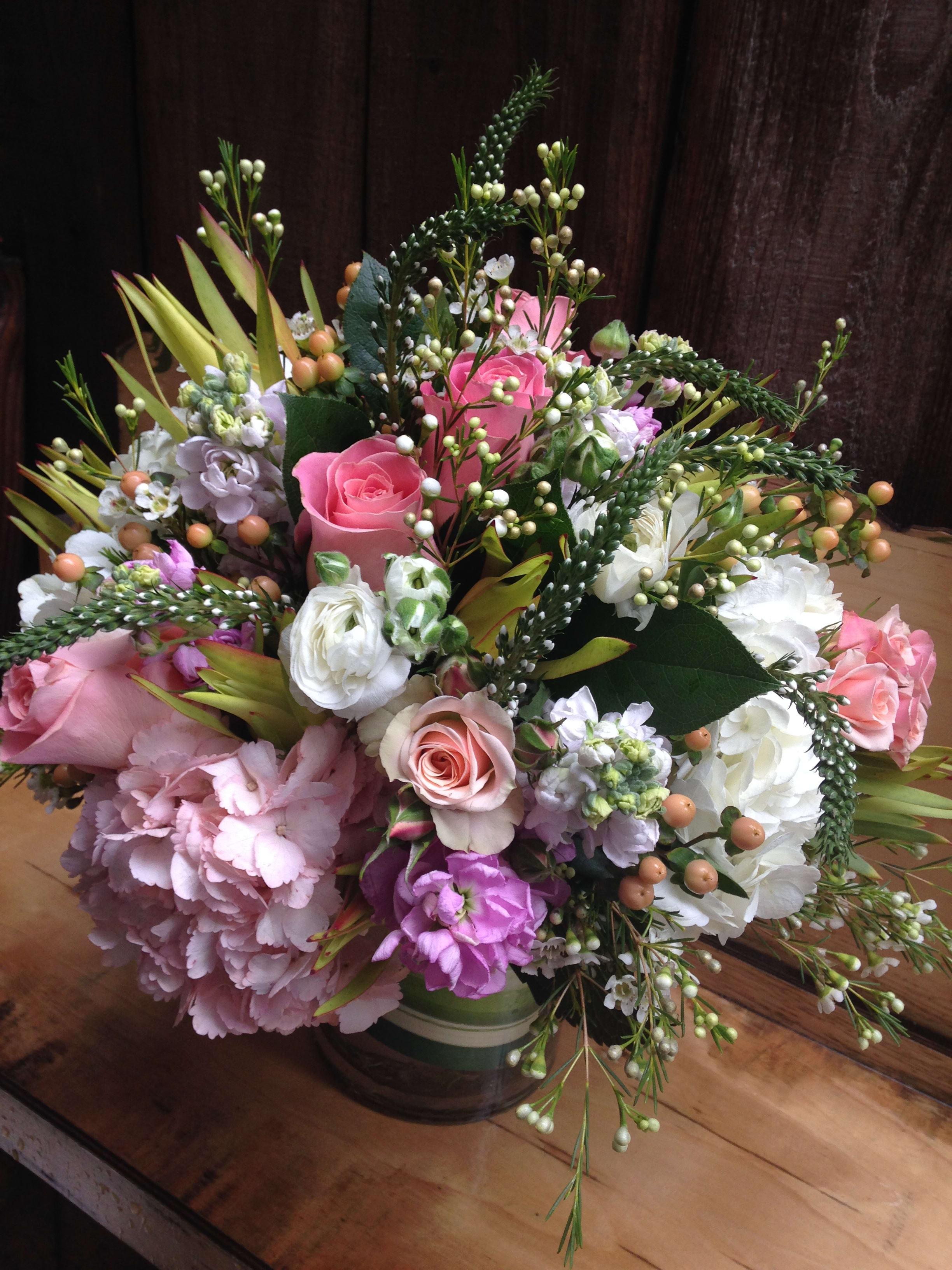 Mixed pink and white flower bouquet in a glass vase