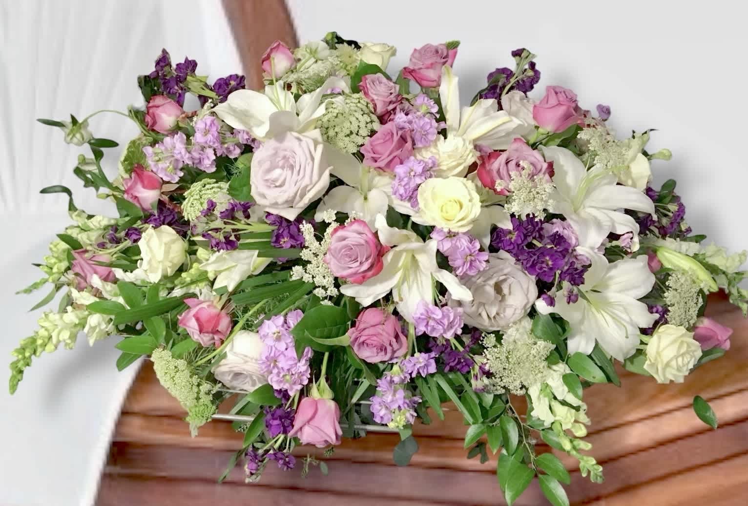 Large mixed bouquet of pink, white, and purple flowers