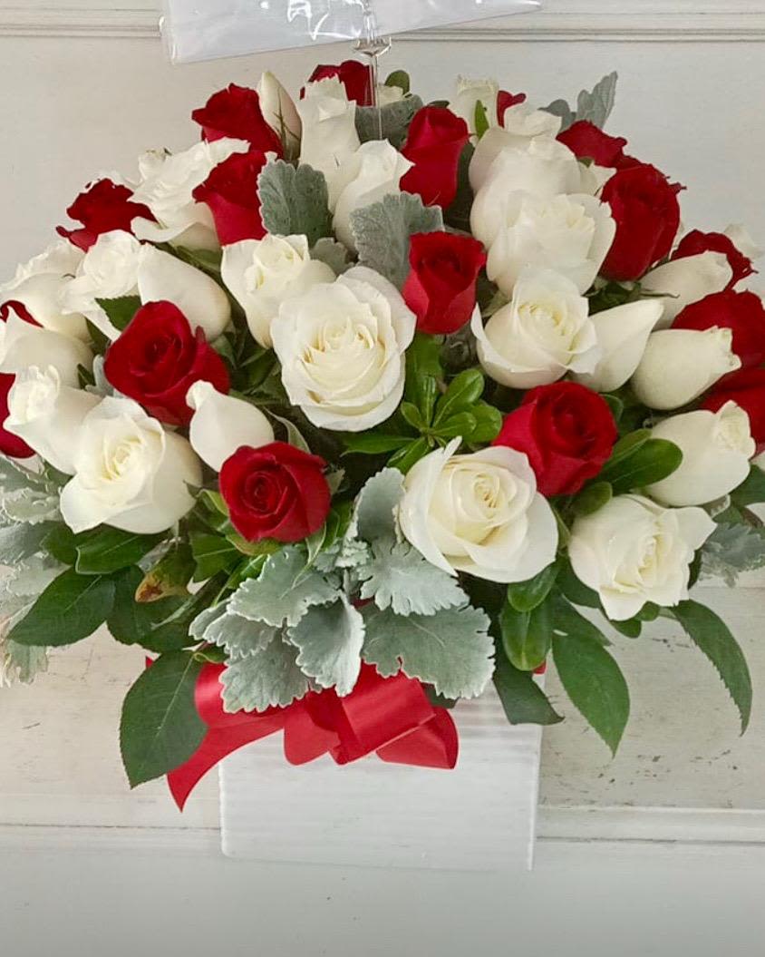 Patriotic Elegance | Red &amp; White Rose Luxury Arrangement -  The timeless combination of red and white roses symbolizes love, admiration, respect and new beginnings, making this arrangement an exceptional choice for anniversaries, birthdays, sympathy services, funeral flowers, memorial tributes, congratulations, thank you gifts, corporate gifts, housewarming celebrations, Valentine's Day, Mother's Day and romantic surprises.  Each arrangement is handcrafted using premium fresh flowers and is available with same-day flower delivery in San Antonio, including Stone Oak, Alamo Heights, The Dominion, Shavano Park, Castle Hills, Medical Center, Helotes, Leon Valley, Schertz, Cibolo, Live Oak, Universal City, Boerne, Timberwood Park, Bulverde and surrounding communities.  If you're searching for red roses, white roses, rose arrangements, sympathy flowers, anniversary flowers, luxury flower delivery, same-day flower delivery or a trusted florist in San Antonio, Snyder Flowers creates elegant floral gifts designed with exceptional quality, freshness and attention to detail.
