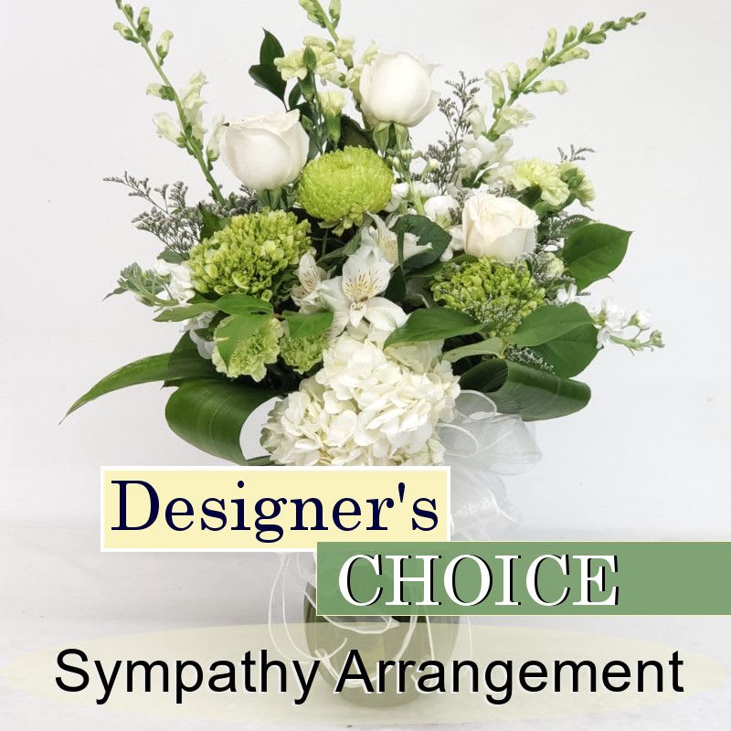 White and green sympathy arrangement with roses and hydrangea in a vase