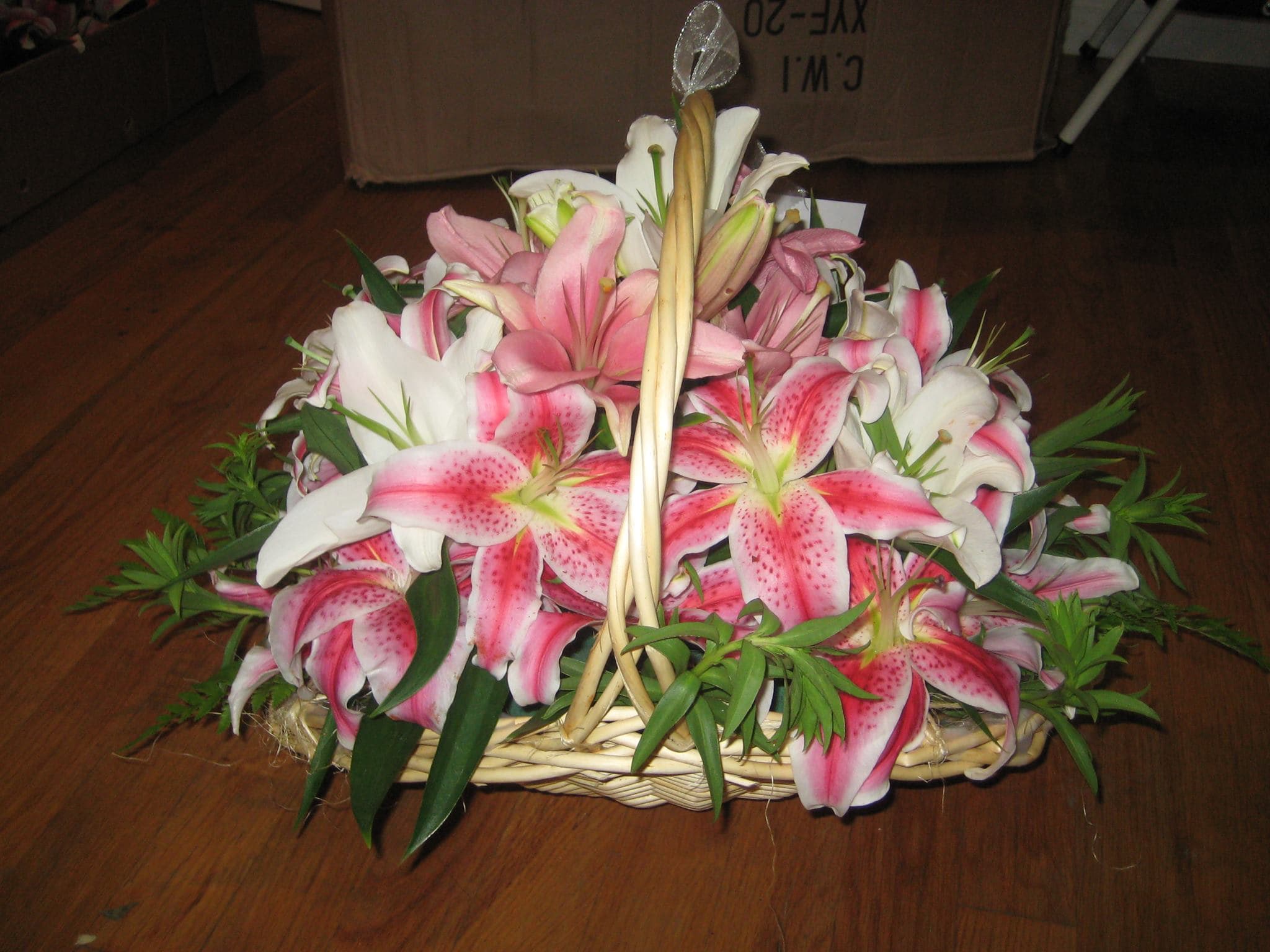 Fire Side and other Baskets - Please call (347) 492 - 5777 for variations and options. Available any size any price any flowers and can be done as a hand rapped bouquet or basket or box.
