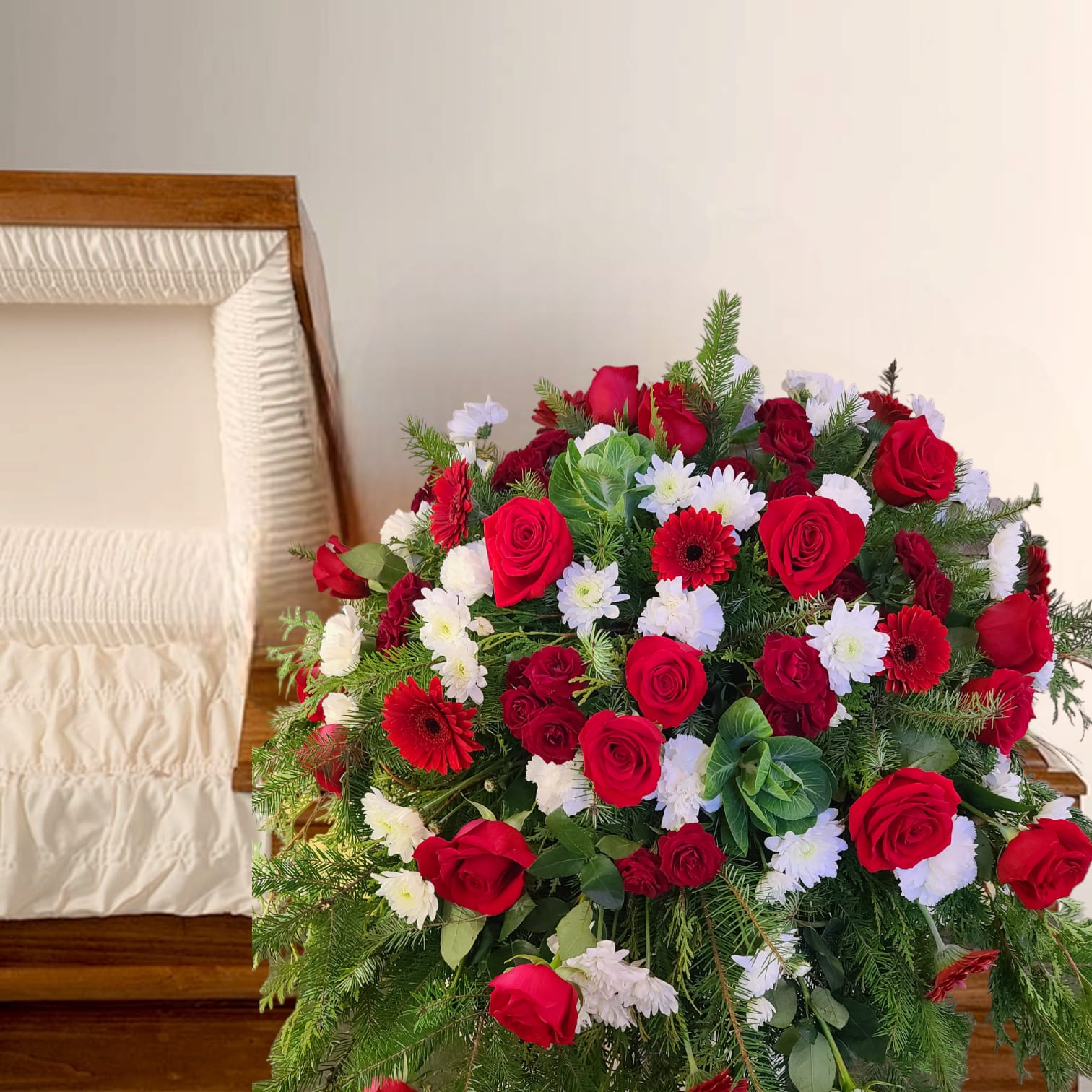 Large red and white floral spray with roses and daisies