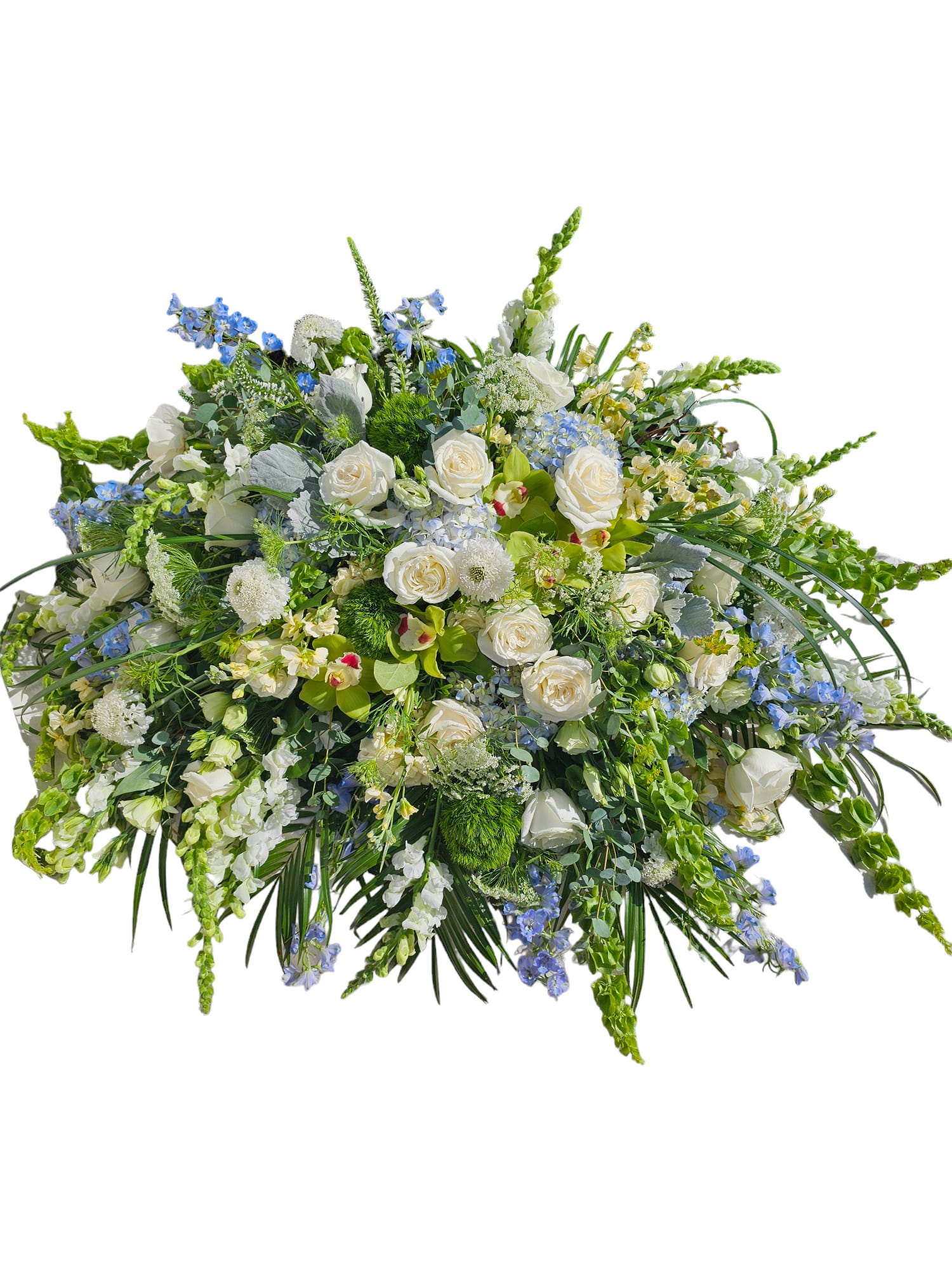 Large white and blue floral spray with roses and mixed blooms
