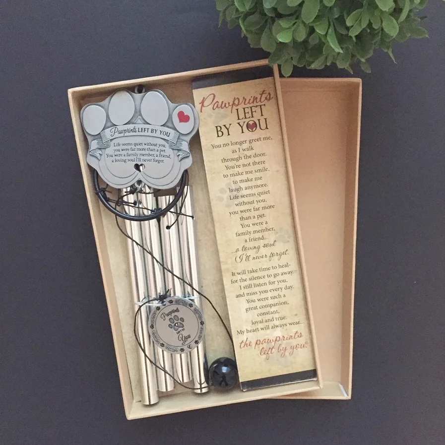 Pet memorial gift set with pawprint keepsakes and a sympathy poem card