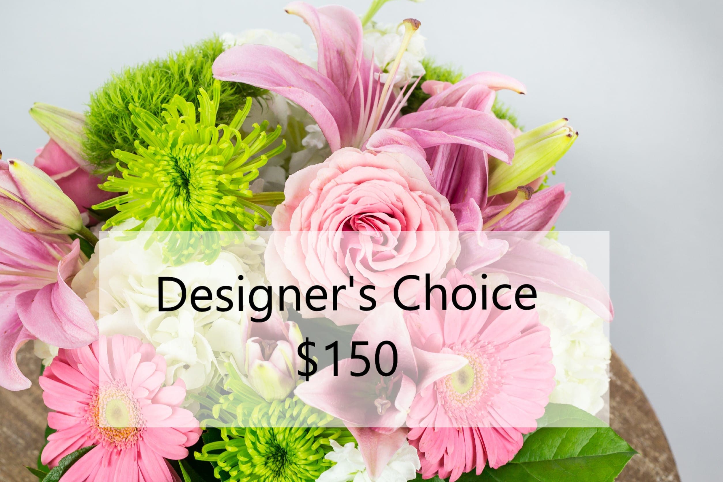 Pink and green mixed bouquet with lilies, roses, and daisies