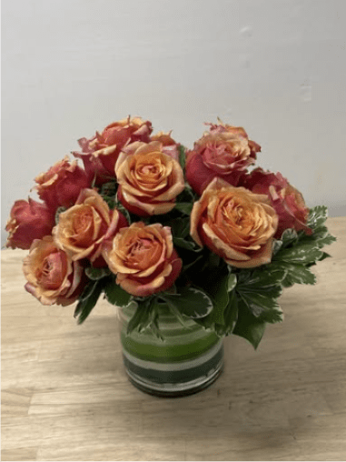 Full and Low Cherry Brandy Roses - roses, simply arranged in a short cylinder. 
