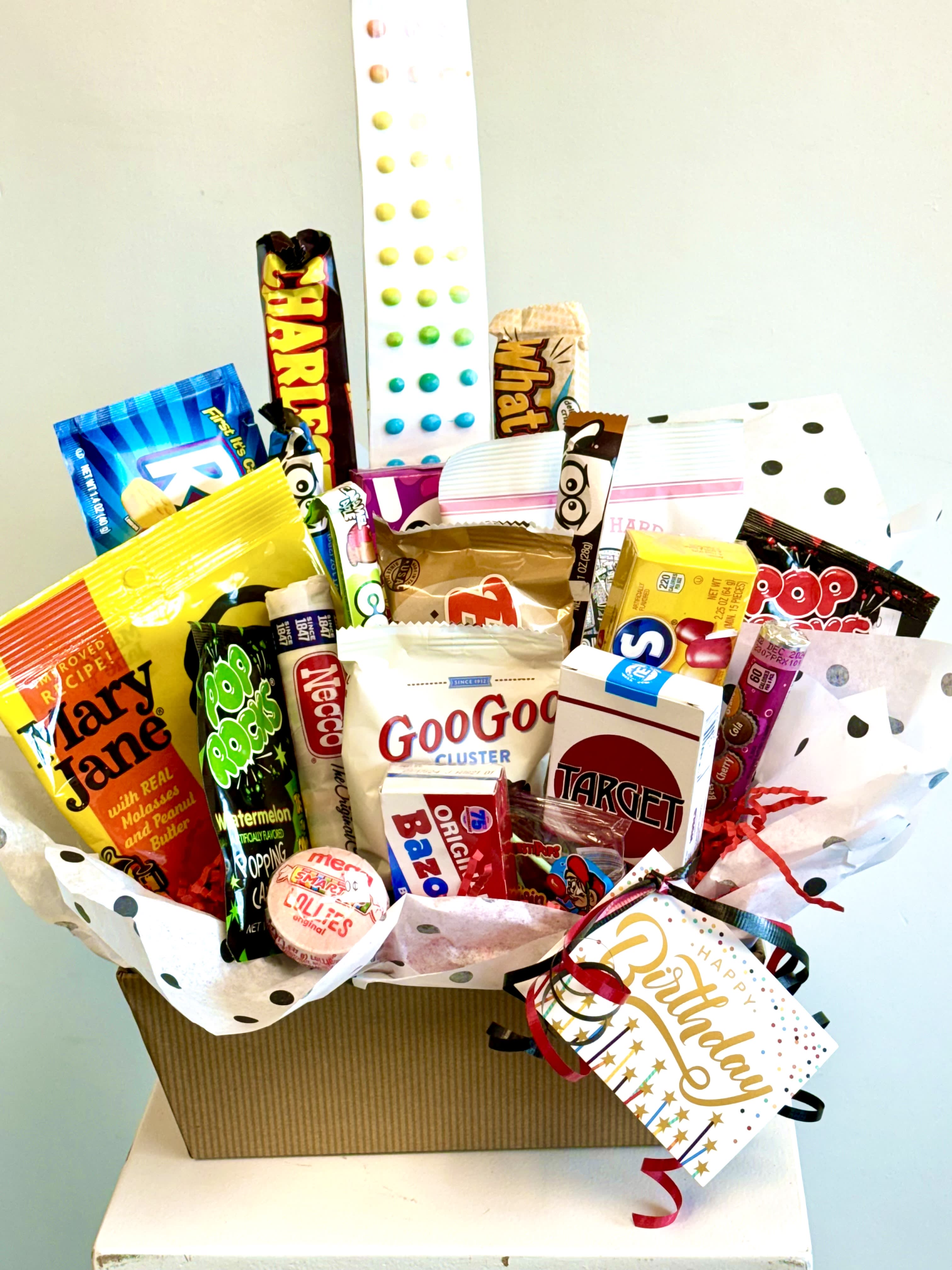 Old school candy birthday box - What a fun gift for someone who has a sweet tooth!  This box is filled to the brim with old school candy like Mary Janes, Watchamacalit, candy cigarettes and so much more!  