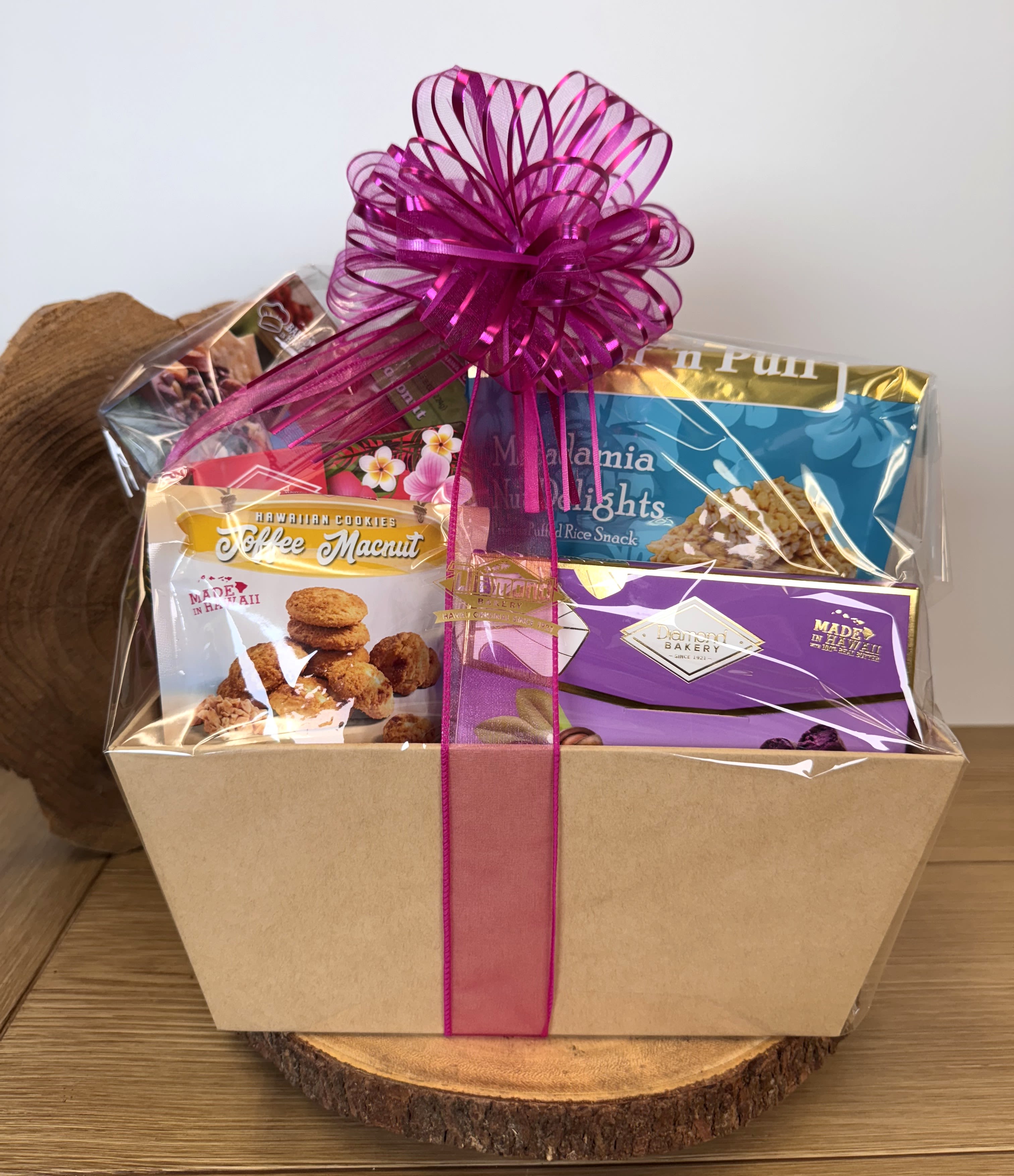 New Item! Diamond Bakery Gift Set (Large) - Diamond Bakery Snack Basket – A Taste of Hawaiʻi in Every Bite   Bring the flavors of the islands to your home or share aloha with loved ones through our Diamond Bakery Snack Basket, featuring Hawaiʻi’s most famous legacy food brand. Filled with beloved local Diamond Bakery favorites, these baskets are available in three convenient sizes and make the perfect gift for any occasion.  Why Choose Our Diamond Bakery Snack Basket?   Three Sizes Available: Choose from Small, Medium, or Large to fit any celebration or gifting need.   Packed with Local Favorites: Each basket is brimming with Diamond Bakery classics—Hawaiian cookies, crackers, and more island-inspired snacks.   A Legacy Brand Since 1921: Diamond Bakery has been Hawaiʻi’s trusted name in snacks for over 100 years.   Perfect for Any Occasion: From birthdays to thank-you gifts, corporate events to holiday celebrations, this basket shares the spirit of aloha.   Locally Made in Hawaiʻi: Support a Hawaiian-owned company while enjoying the authentic taste of the islands.  Who This Basket Is For Friends or family, or treat employees to a corporate thank-you gift, or stock your home with local flavors, our Diamond Bakery Snack Basket is the perfect choice.  Delivery &amp; Availability   Available for local delivery across Oʻahu   Freshly packed to ensure the best taste experience