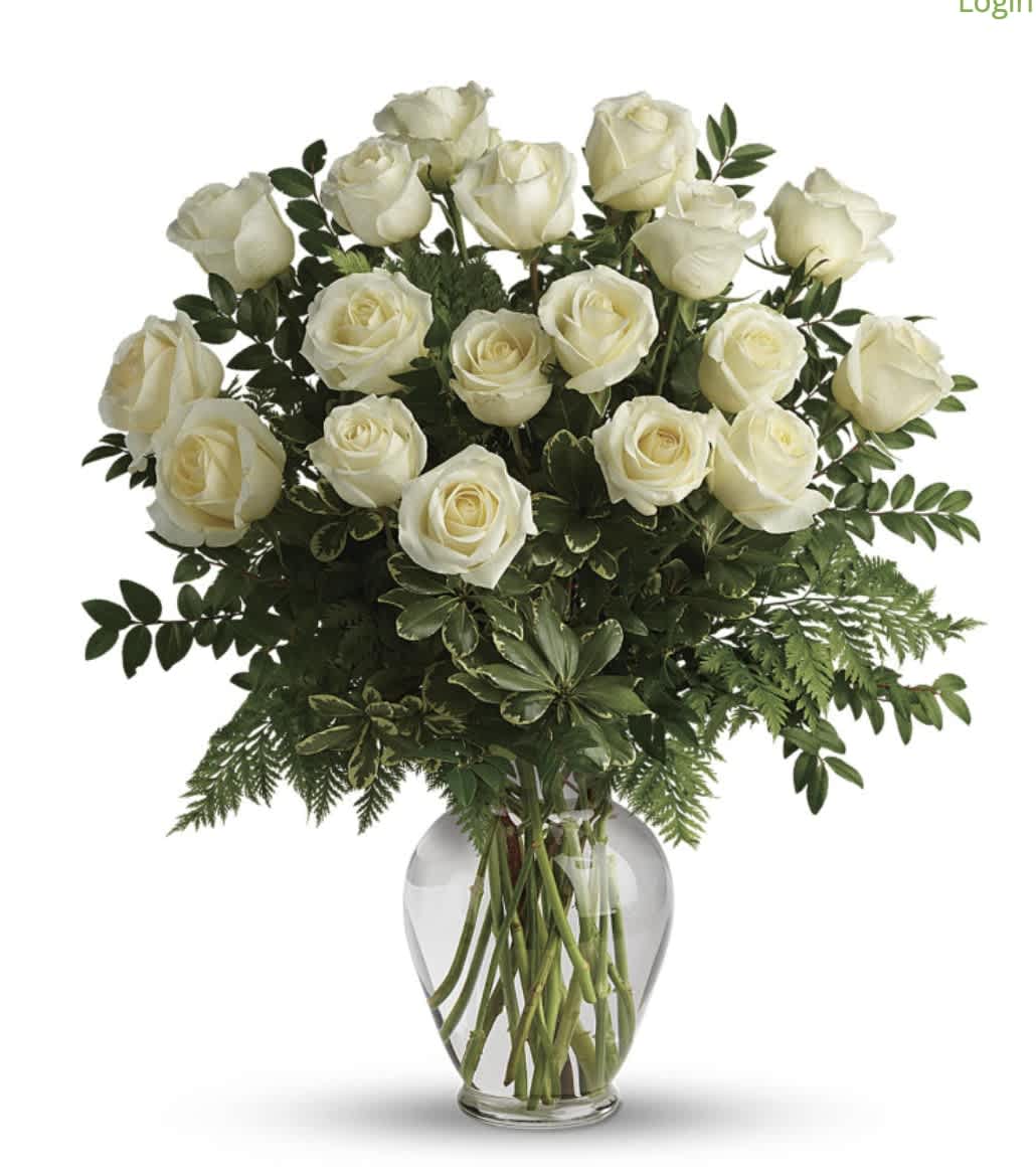Bouquet of white roses in a clear glass vase